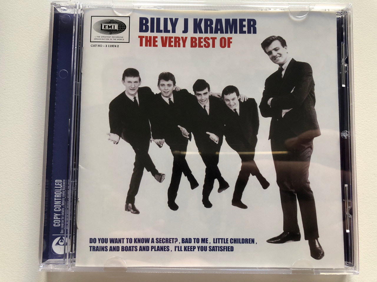 https://cdn10.bigcommerce.com/s-62bdpkt7pb/products/0/images/216870/Billy_J_Kramer_The_Very_Best_Of_Do_You_Want_To_Know_A_Secret_Bad_To_Me_Little_Children_Trains_And_Boats_And_Planes_Ill_Keep_You_Satisfied_EMI_Audio_CD_2005_094631197420_1__09128.1647530592.1280.1280.JPG?c=2&_gl=1*5frt3x*_ga*MjA2NTIxMjE2MC4xNTkwNTEyNTMy*_ga_WS2VZYPC6G*MTY0NzUyNDk4OS4zMjMuMS4xNjQ3NTMwMjc0LjQ0