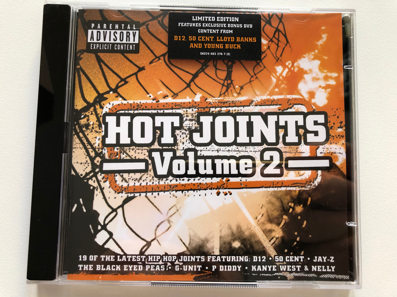 https://cdn10.bigcommerce.com/s-62bdpkt7pb/products/0/images/216886/Hot_Joints_-_Volume_2_19_of_the_latest_hip_hop_joints_featuring_D12_50_Cent_Jay-Z_The_Black_Eyed_Peas_G-Unit_P_Diddy_Kanye_West_Nelly_Limited_Edition_Universal_Audio_CD_DVD_200_1__24864.1647533226.1280.1280.JPG?c=2&_gl=1*wi1wtb*_ga*MjA2NTIxMjE2MC4xNTkwNTEyNTMy*_ga_WS2VZYPC6G*MTY0NzUyNDk4OS4zMjMuMS4xNjQ3NTMzMTk5LjYw