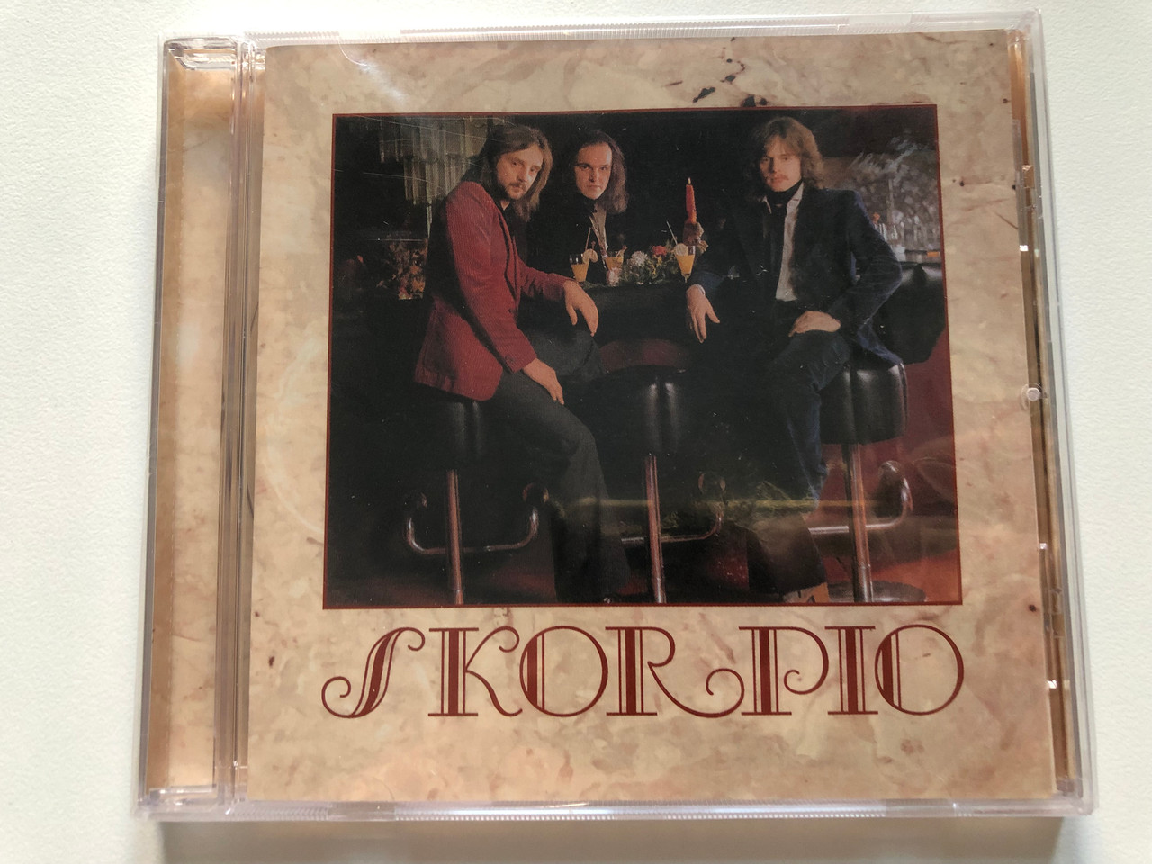 https://cdn10.bigcommerce.com/s-62bdpkt7pb/products/0/images/216950/Skorpi_j_Skorpi_GrundRecords_Audio_CD_2013_GR023_1__18067.1647537133.1280.1280.JPG?c=2&_gl=1*1h3czyh*_ga*MjA2NTIxMjE2MC4xNTkwNTEyNTMy*_ga_WS2VZYPC6G*MTY0NzUyNDk4OS4zMjMuMS4xNjQ3NTM3MDEyLjQ4