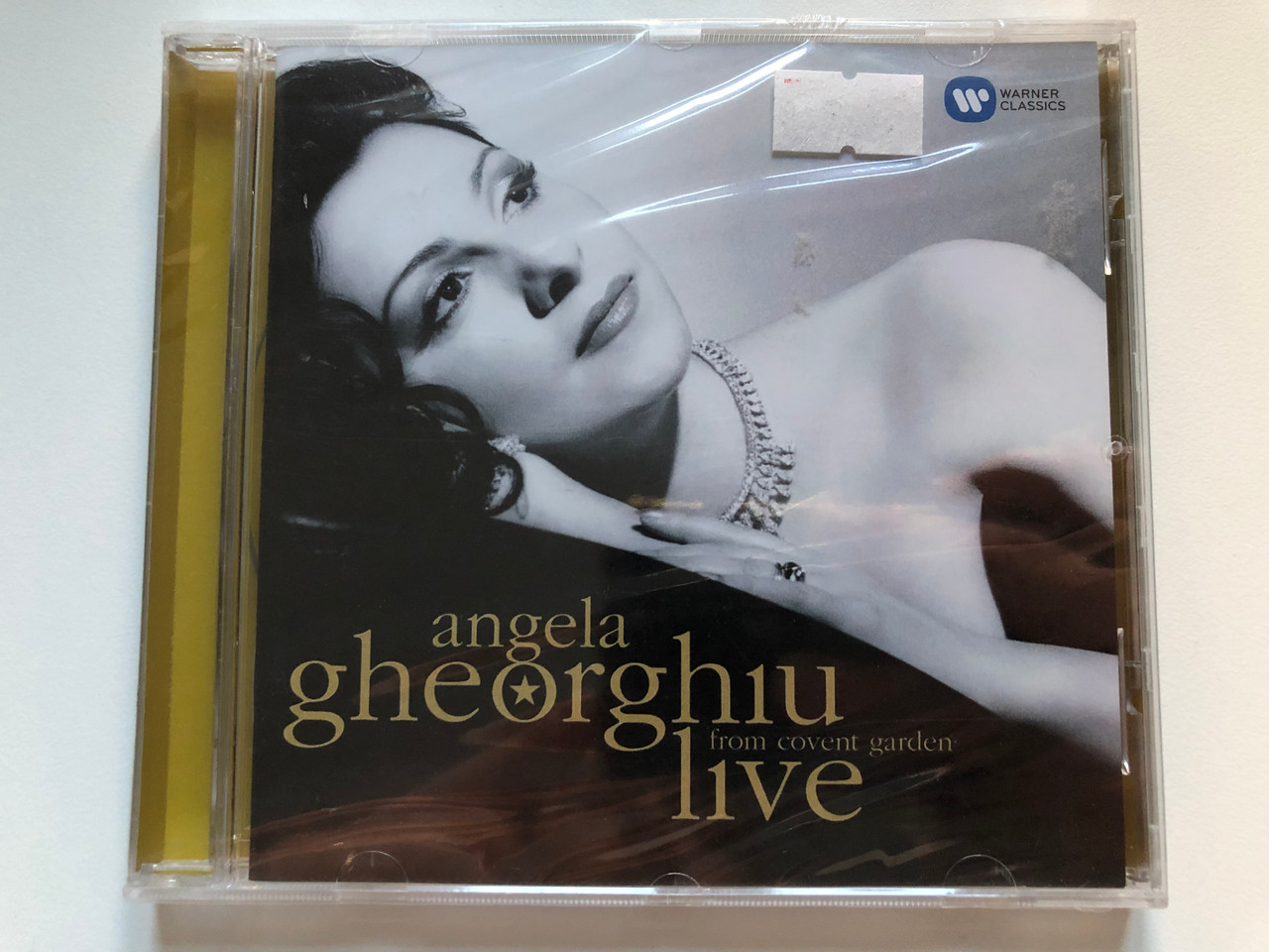 https://cdn10.bigcommerce.com/s-62bdpkt7pb/products/0/images/216984/Angela_Gheorghiu_-_Live_From_Covent_Garden_EMI_Classics_Audio_CD_2017_Stereo_0190295889999_1__24516.1647541399.1280.1280.JPG?c=2&_gl=1*1psndah*_ga*MjA2NTIxMjE2MC4xNTkwNTEyNTMy*_ga_WS2VZYPC6G*MTY0NzUyNDk4OS4zMjMuMS4xNjQ3NTQwOTI3LjQz