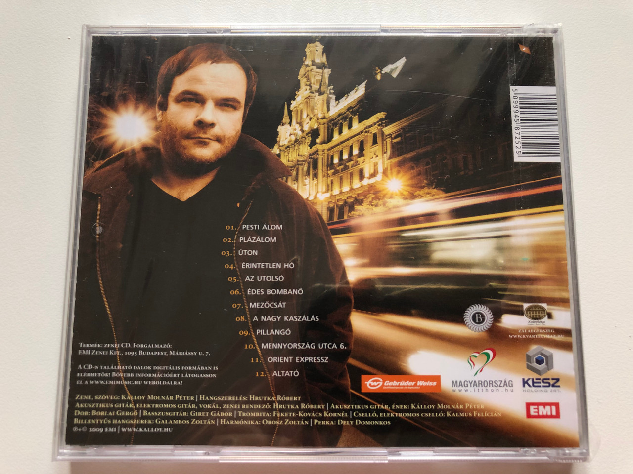 https://cdn10.bigcommerce.com/s-62bdpkt7pb/products/0/images/217980/Klloy_Molnr_Pter_Pesti_lom_EMI_Audio_CD_2009_4587252_2__04938.1647953781.1280.1280.JPG?c=2&_gl=1*vakbee*_ga*MjA2NTIxMjE2MC4xNTkwNTEyNTMy*_ga_WS2VZYPC6G*MTY0Nzk0Nzc1Ni4zMjcuMS4xNjQ3OTUzNzg1LjYw