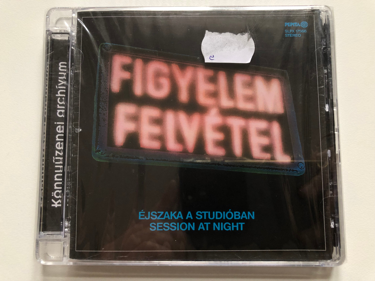 https://cdn10.bigcommerce.com/s-62bdpkt7pb/products/0/images/218240/jszaka_A_Stdiban_-_Session_At_Night_Knnyzenei_Archvum_Alexandra_Records_Audio_CD_2009_PDKCD0049_1__82514.1648051048.1280.1280.JPG?c=2&_gl=1*wox2rj*_ga*MjA2NTIxMjE2MC4xNTkwNTEyNTMy*_ga_WS2VZYPC6G*MTY0ODA0NzU2OC4zMzEuMS4xNjQ4MDUwODk2LjYw