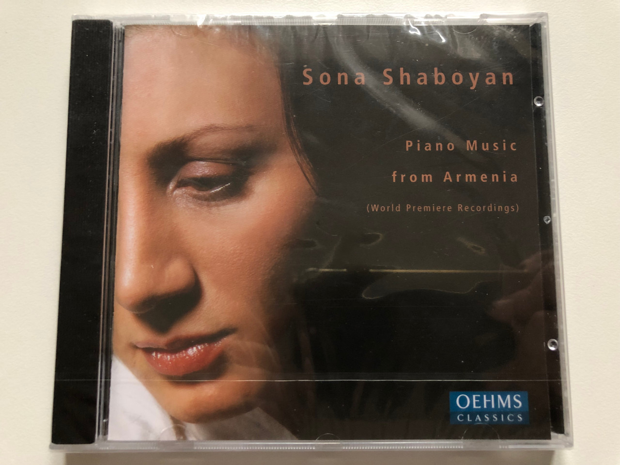 https://cdn10.bigcommerce.com/s-62bdpkt7pb/products/0/images/218253/Sona_Shaboyan_Piano_Music_From_Armenia_World_Premiere_Recordings_Oehms_Classics_Audio_CD_2005_OC_374_1__30784.1648053411.1280.1280.JPG?c=2&_gl=1*18j0zou*_ga*MjA2NTIxMjE2MC4xNTkwNTEyNTMy*_ga_WS2VZYPC6G*MTY0ODA0NzU2OC4zMzEuMS4xNjQ4MDUzMTA1LjEw