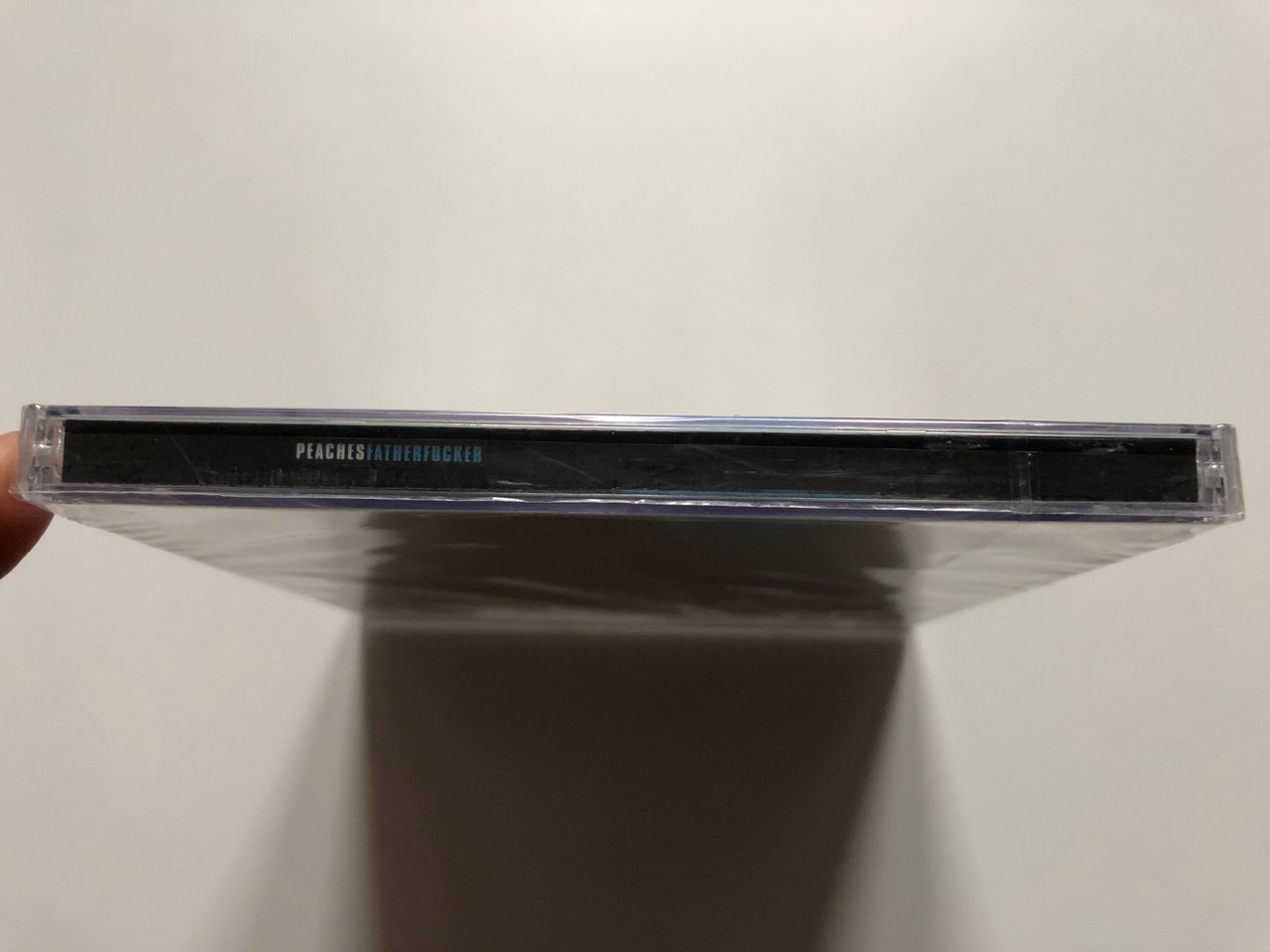 https://cdn10.bigcommerce.com/s-62bdpkt7pb/products/0/images/218298/Peaches_Fatherfucker_XL_Recordings_Audio_CD_2003_XLCD171_3__59525.1648135529.1280.1280.JPG?c=2&_gl=1*1wbv8ma*_ga*MjA2NTIxMjE2MC4xNTkwNTEyNTMy*_ga_WS2VZYPC6G*MTY0ODEzMzQ0Mi4zMzIuMS4xNjQ4MTM1MzExLjI0
