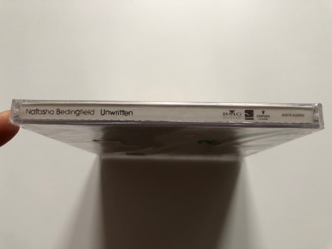 https://cdn10.bigcommerce.com/s-62bdpkt7pb/products/0/images/218301/Natasha_Bedingfield_Unwritten_BMG_UK_Ireland_Audio_CD_2004_82876_639992_3__77092.1648136167.1280.1280.JPG?c=2&_gl=1*mu6amc*_ga*MjA2NTIxMjE2MC4xNTkwNTEyNTMy*_ga_WS2VZYPC6G*MTY0ODEzMzQ0Mi4zMzIuMS4xNjQ4MTM2MTE3LjYw