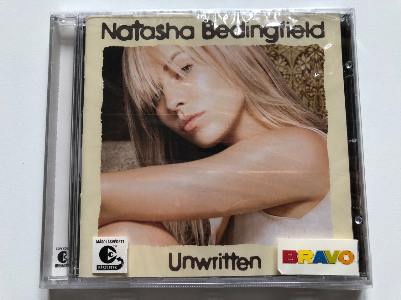 https://cdn10.bigcommerce.com/s-62bdpkt7pb/products/0/images/218303/Natasha_Bedingfield_Unwritten_BMG_UK_Ireland_Audio_CD_2004_82876_639992_1__73937.1648136177.1280.1280.JPG?c=2&_gl=1*mu6amc*_ga*MjA2NTIxMjE2MC4xNTkwNTEyNTMy*_ga_WS2VZYPC6G*MTY0ODEzMzQ0Mi4zMzIuMS4xNjQ4MTM2MTE3LjYw