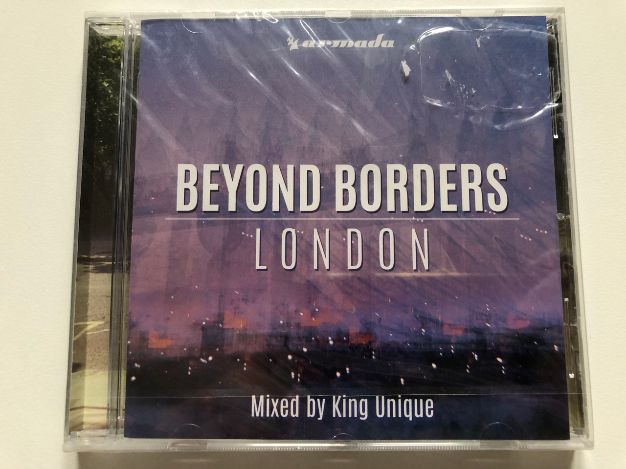 https://cdn10.bigcommerce.com/s-62bdpkt7pb/products/0/images/218317/Beyond_Borders_London_-_Mixed_By_King_Unique_Armada_Audio_CD_2015_88875098302_1__43660.1648139419.1280.1280.JPG?c=2&_gl=1*1ga1qfa*_ga*MjA2NTIxMjE2MC4xNTkwNTEyNTMy*_ga_WS2VZYPC6G*MTY0ODEzMzQ0Mi4zMzIuMS4xNjQ4MTM5Mzk4LjYw