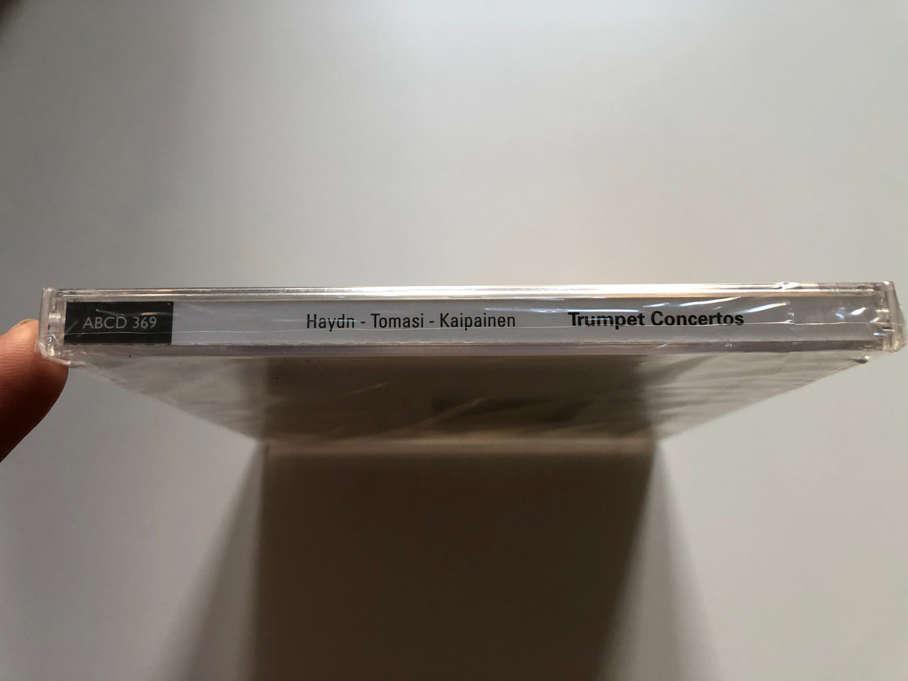 https://cdn10.bigcommerce.com/s-62bdpkt7pb/products/0/images/218355/Kaipainen_Haydn_Tomasi_-_Trumpet_Concertos_Pasi_Pirinen_Tampere_Philharmonic_Orchestra_Hannu_Lintu_Alba_Records_Audio_CD_2014_ABCD_369_3__54515.1648147995.1280.1280.JPG?c=2&_gl=1*vecxy7*_ga*MjA2NTIxMjE2MC4xNTkwNTEyNTMy*_ga_WS2VZYPC6G*MTY0ODEzMzQ0Mi4zMzIuMS4xNjQ4MTQ3ODI4LjQ5