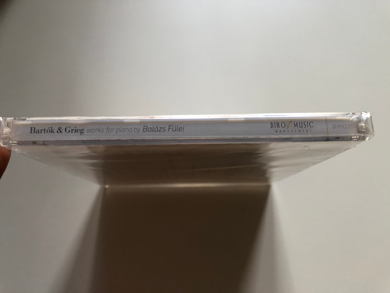 https://cdn10.bigcommerce.com/s-62bdpkt7pb/products/0/images/218433/Bartok_Grieg_-_Works_for_piano_-_By_Balazs_Fulei_Biro_Music_Audio_CD_2013_BMM006_3__45960.1648220522.1280.1280.JPG?c=2&_gl=1*1kngdmd*_ga*MjA2NTIxMjE2MC4xNTkwNTEyNTMy*_ga_WS2VZYPC6G*MTY0ODIxMDI4Ny4zMzMuMS4xNjQ4MjIwNTA5LjYw