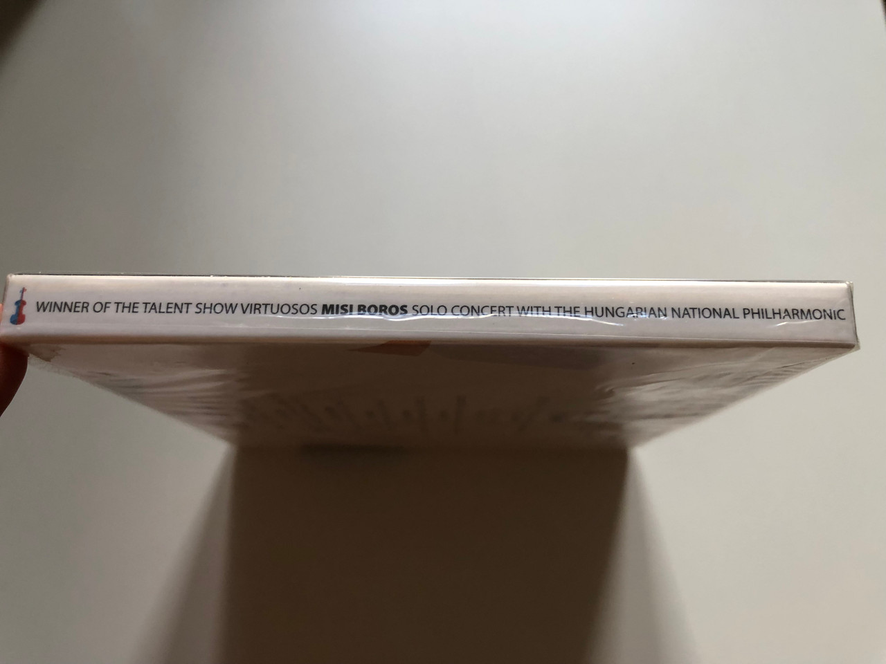 https://cdn10.bigcommerce.com/s-62bdpkt7pb/products/0/images/218439/Winner_of_the_talent_show_Virtuosos_-_Misi_Boros_solo_concert_-_with_the_Hungarian_National_Philharmonic_Two_Discs_Deluxe_Edition_Virtuozok_2x_Audio_CD_3__36264.1648221704.1280.1280.JPG?c=2&_gl=1*102w4gq*_ga*MjA2NTIxMjE2MC4xNTkwNTEyNTMy*_ga_WS2VZYPC6G*MTY0ODIxMDI4Ny4zMzMuMS4xNjQ4MjIxNDU2LjU4
