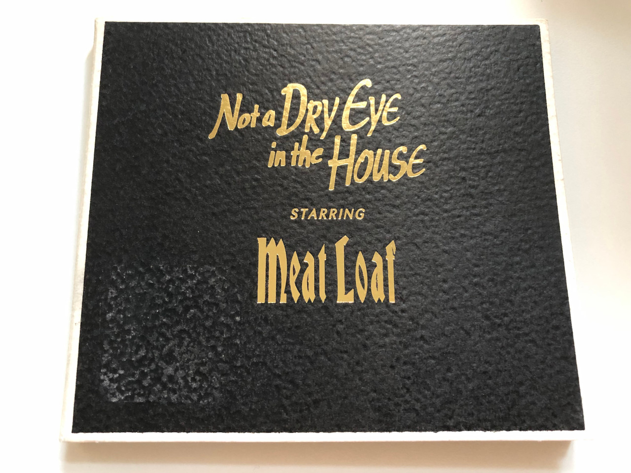 https://cdn10.bigcommerce.com/s-62bdpkt7pb/products/0/images/218726/Not_A_Dry_Eye_In_The_House_Starring_Meat_Loaf_Virgin_Audio_CD_1996_VSCDX_1567_1__58479.1648463874.1280.1280.JPG?c=2&_gl=1*t8flub*_ga*MjA2NTIxMjE2MC4xNTkwNTEyNTMy*_ga_WS2VZYPC6G*MTY0ODQ0NzY1MC4zMzQuMS4xNjQ4NDYzODEyLjYw