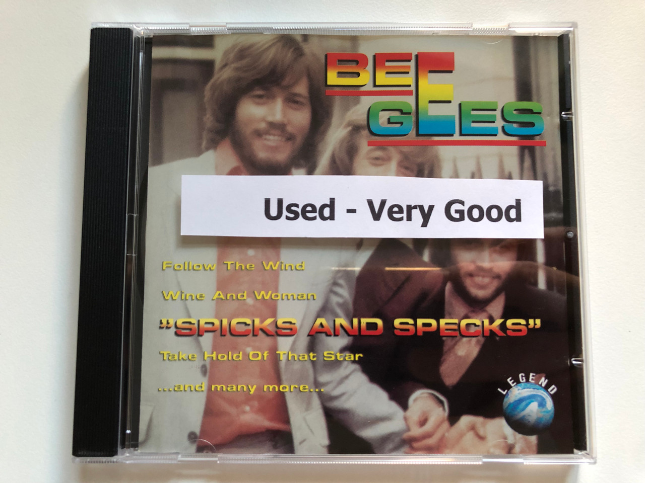 https://cdn10.bigcommerce.com/s-62bdpkt7pb/products/0/images/218896/Bee_Gees_Spicks_And_Specks_Follow_The_Wind_Wine_And_Woman_Take_Hold_Of_That_Star_and_many_more..._Legend_Audio_CD_1993_WZ_90005_5__65029.1648523192.1280.1280.JPG?c=2&_gl=1*1dxyo60*_ga*MjA2NTIxMjE2MC4xNTkwNTEyNTMy*_ga_WS2VZYPC6G*MTY0ODUyMjY0NC4zMzUuMS4xNjQ4NTIzMTk1LjYw