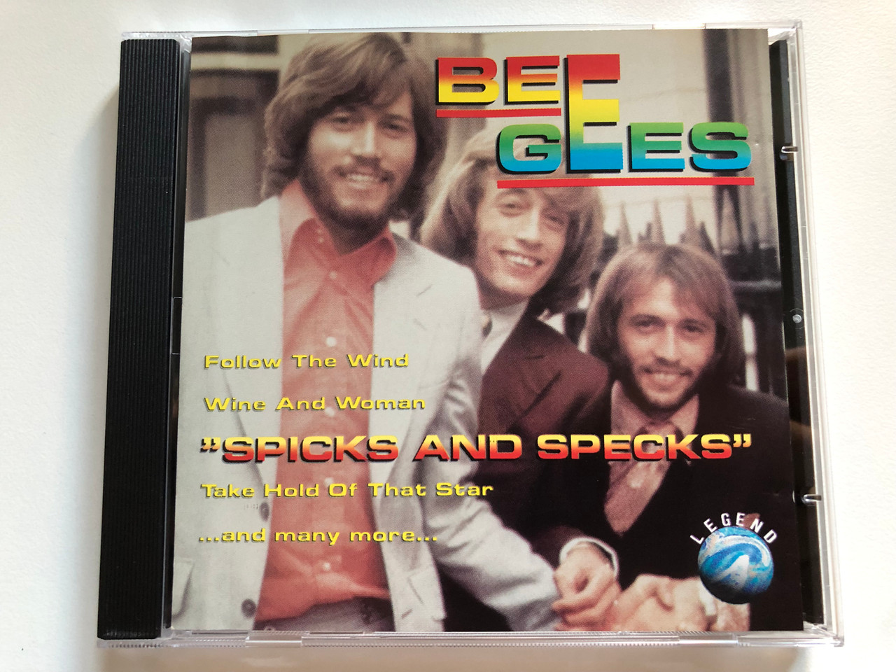 https://cdn10.bigcommerce.com/s-62bdpkt7pb/products/0/images/218900/Bee_Gees_Spicks_And_Specks_Follow_The_Wind_Wine_And_Woman_Take_Hold_Of_That_Star_and_many_more..._Legend_Audio_CD_1993_WZ_90005_1__14352.1648523196.1280.1280.JPG?c=2&_gl=1*1dxyo60*_ga*MjA2NTIxMjE2MC4xNTkwNTEyNTMy*_ga_WS2VZYPC6G*MTY0ODUyMjY0NC4zMzUuMS4xNjQ4NTIzMTk1LjYw
