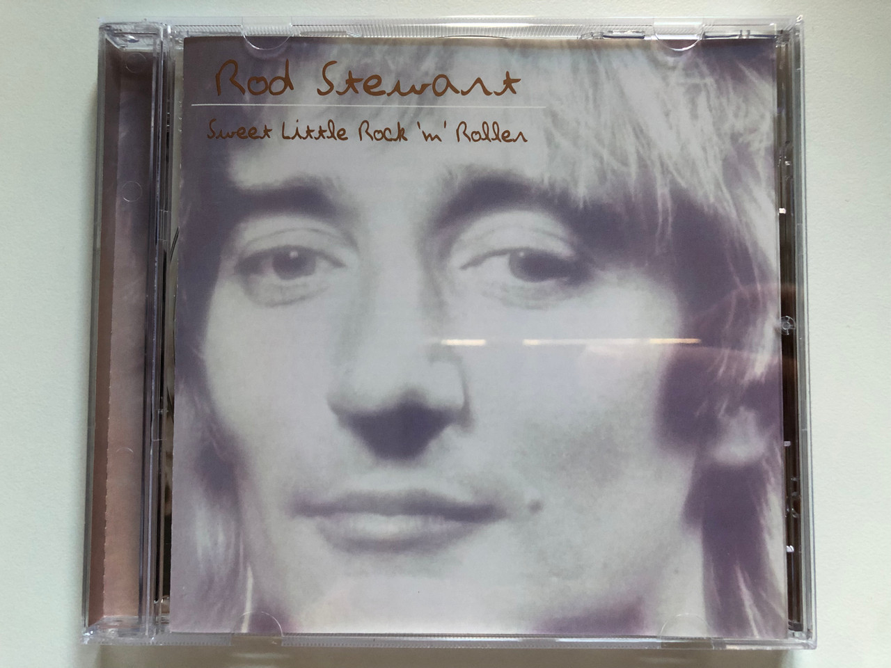 https://cdn10.bigcommerce.com/s-62bdpkt7pb/products/0/images/218912/Rod_Stewart_Sweet_Little_Rock_N_Roller_Spectrum_Music_Audio_CD_2002_0631062_1__39556.1648524399.1280.1280.JPG?c=2&_gl=1*1st4fo1*_ga*MjA2NTIxMjE2MC4xNTkwNTEyNTMy*_ga_WS2VZYPC6G*MTY0ODUyMjY0NC4zMzUuMS4xNjQ4NTI0Mjc5LjU5