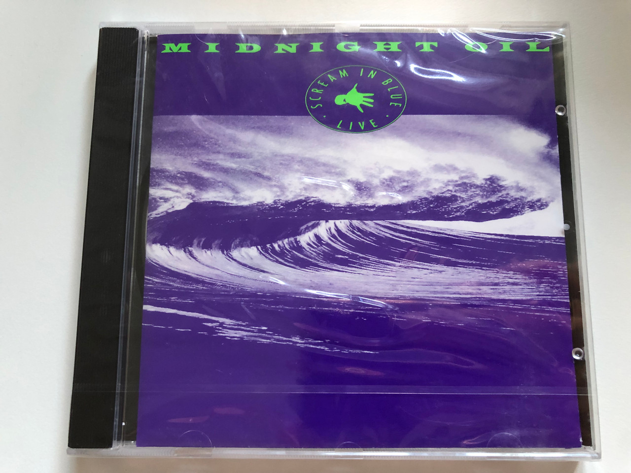 https://cdn10.bigcommerce.com/s-62bdpkt7pb/products/0/images/218939/Midnight_Oil_Scream_In_Blue_-_Live_Columbia_Audio_CD_1992_471453_2_1__92326.1648527643.1280.1280.JPG?c=2&_gl=1*17dwn7e*_ga*MjA2NTIxMjE2MC4xNTkwNTEyNTMy*_ga_WS2VZYPC6G*MTY0ODUyMjY0NC4zMzUuMS4xNjQ4NTI3NTIxLjQ0