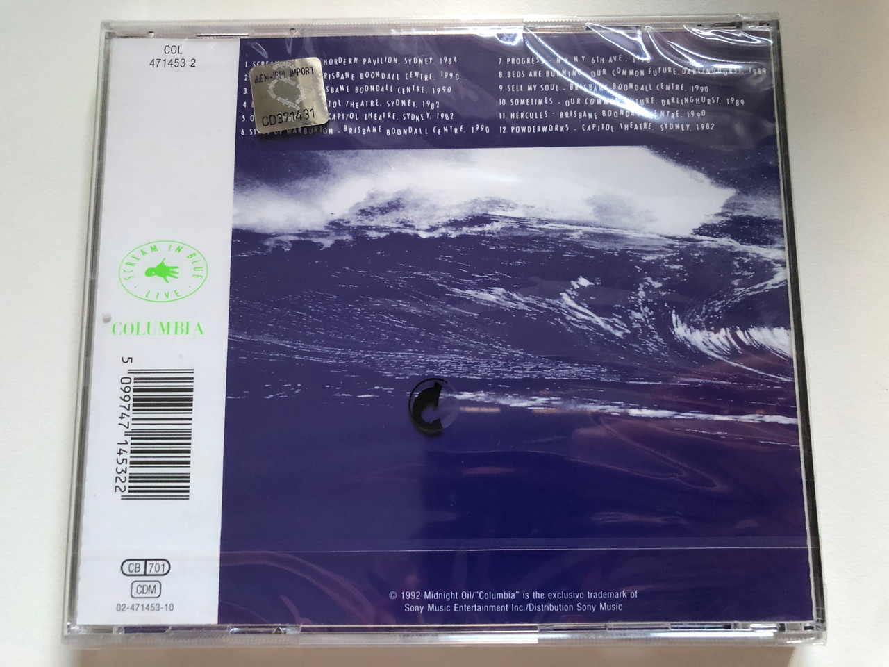 https://cdn10.bigcommerce.com/s-62bdpkt7pb/products/0/images/218940/Midnight_Oil_Scream_In_Blue_-_Live_Columbia_Audio_CD_1992_471453_2_2__37566.1648527644.1280.1280.JPG?c=2&_gl=1*17dwn7e*_ga*MjA2NTIxMjE2MC4xNTkwNTEyNTMy*_ga_WS2VZYPC6G*MTY0ODUyMjY0NC4zMzUuMS4xNjQ4NTI3NTIxLjQ0