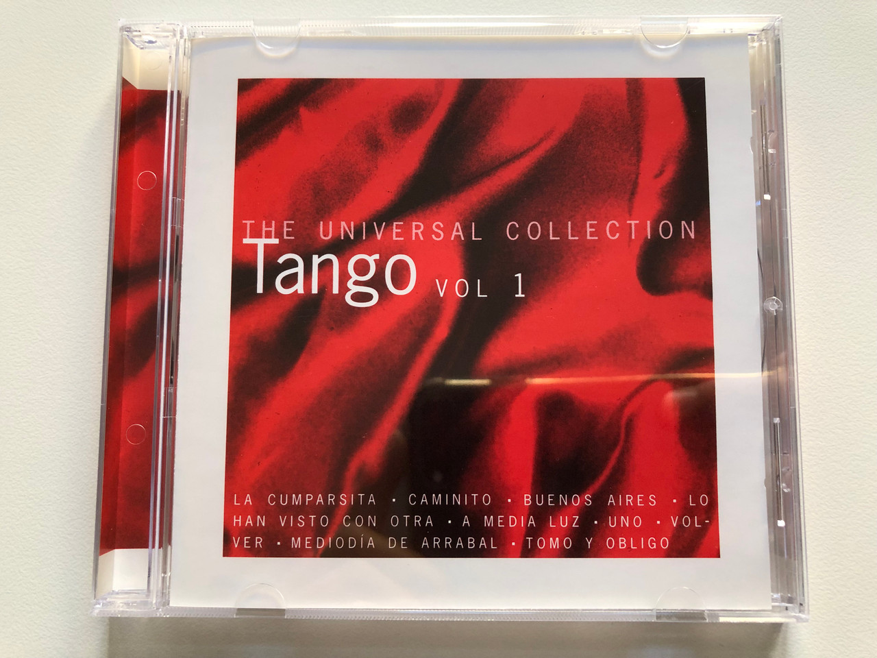 https://cdn10.bigcommerce.com/s-62bdpkt7pb/products/0/images/219502/The_Universal_Collection_Tango_Vol_1_La_Cumparsita_Caminito_Buenos_Aires_Lo_Han_Visto_Con_Otra_A_Media_Luz_Uno_Volver_Mediodia_De_Arrabal_Tomo_Y_Obligo_Knife_Music_Audio_CD_44619_1__76306.1648618104.1280.1280.JPG?c=2&_gl=1*1a613d1*_ga*MjA2NTIxMjE2MC4xNTkwNTEyNTMy*_ga_WS2VZYPC6G*MTY0ODYxNjU4NS4zMzcuMS4xNjQ4NjE3NzAwLjU3