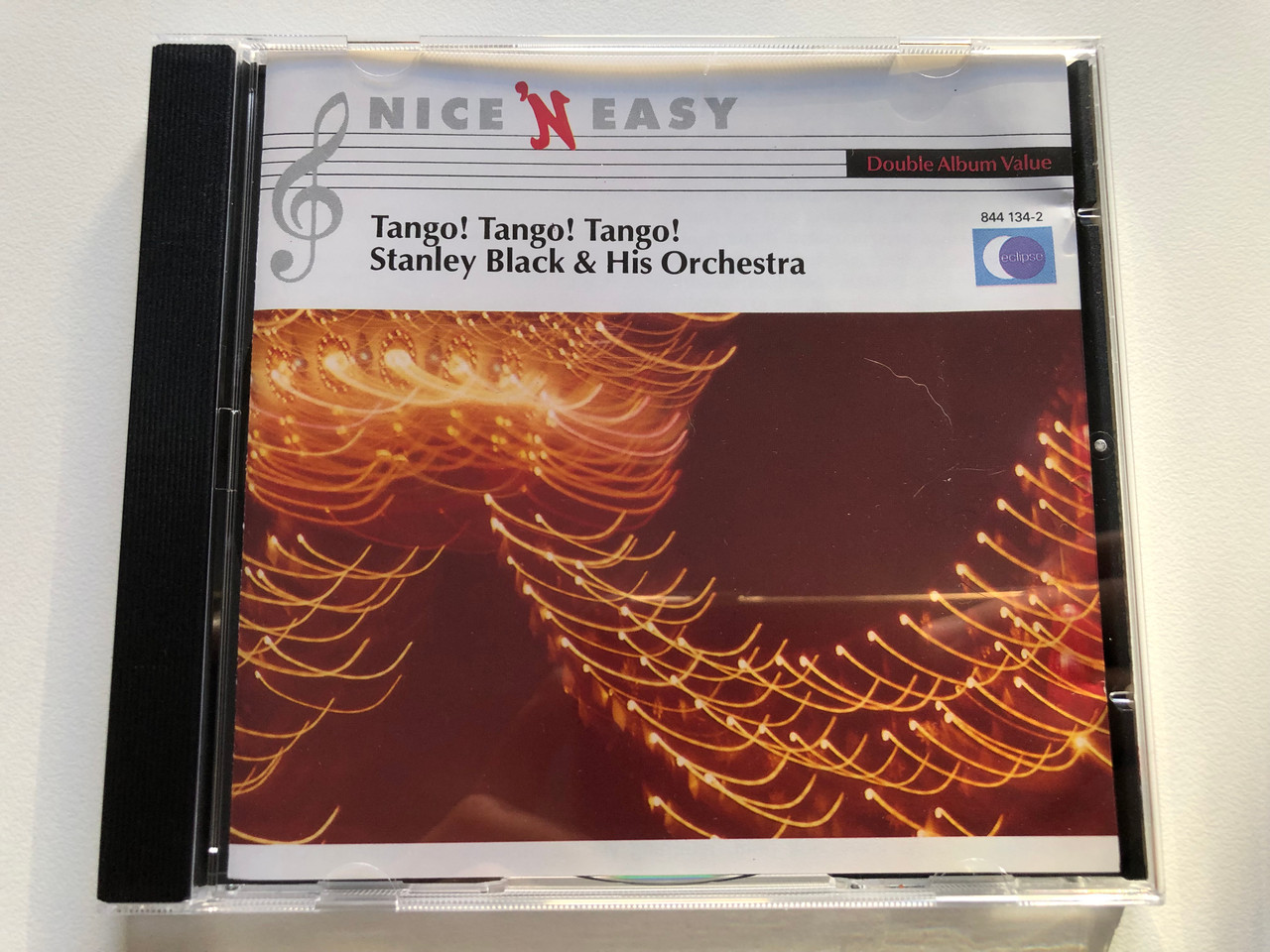 https://cdn10.bigcommerce.com/s-62bdpkt7pb/products/0/images/219615/Tango_Tango_Tango_-_Stanley_Black_His_Orchestra_Nice_N_Easy_Eclipse_Audio_CD_1991_Stereo_844_134-2_1__26158.1648623662.1280.1280.JPG?c=2&_gl=1*19slljs*_ga*MjA2NTIxMjE2MC4xNTkwNTEyNTMy*_ga_WS2VZYPC6G*MTY0ODYxNjU4NS4zMzcuMS4xNjQ4NjIzNDE5LjU4