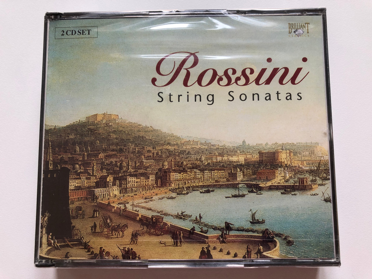 https://cdn10.bigcommerce.com/s-62bdpkt7pb/products/0/images/219936/Rossini_String_Sonatas_Brilliant_Classics_2x_Audio_CD_92116_1__35812.1648705078.1280.1280.JPG?c=2&_gl=1*tkcmrr*_ga*MjA2NTIxMjE2MC4xNTkwNTEyNTMy*_ga_WS2VZYPC6G*MTY0ODcwMjQ5OS4zMzguMS4xNjQ4NzA1MDA4LjYw