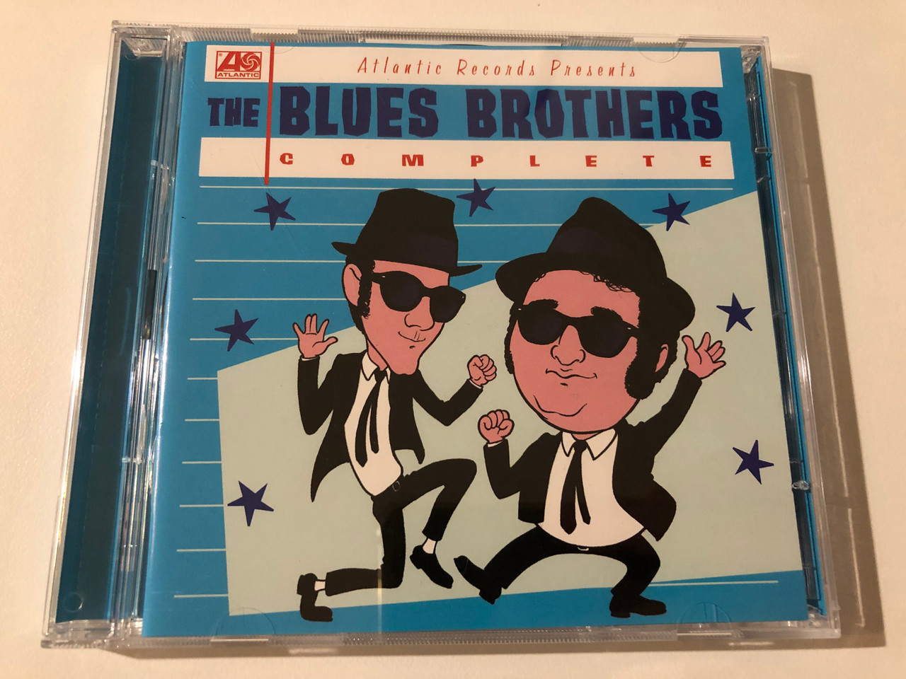 https://cdn10.bigcommerce.com/s-62bdpkt7pb/products/0/images/219996/The_Blues_Brothers_Complete_Atlantic_2x_Audio_CD_7567_80840_2_1__02339.1648718475.1280.1280.JPG?c=2&_gl=1*fvotr1*_ga*MjA2NTIxMjE2MC4xNTkwNTEyNTMy*_ga_WS2VZYPC6G*MTY0ODcwMjQ5OS4zMzguMS4xNjQ4NzE3OTM1LjQy