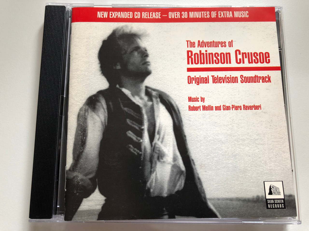 https://cdn10.bigcommerce.com/s-62bdpkt7pb/products/0/images/220062/The_Adventures_Of_Robinson_Crusoe_Original_Television_Soundtrack_Music_by_Robert_Mellin_And_Gian-Piero_Reverberi_New_Expanded_CD_Release_-_Over_30_Minutes_Of_Extra_Music_Silva_Screen_A_1__96196.1648785807.1280.1280.JPG?c=2&_gl=1*a328gj*_ga*MjA2NTIxMjE2MC4xNTkwNTEyNTMy*_ga_WS2VZYPC6G*MTY0ODc4MDMyNC4zMzkuMS4xNjQ4Nzg1NDEzLjUw