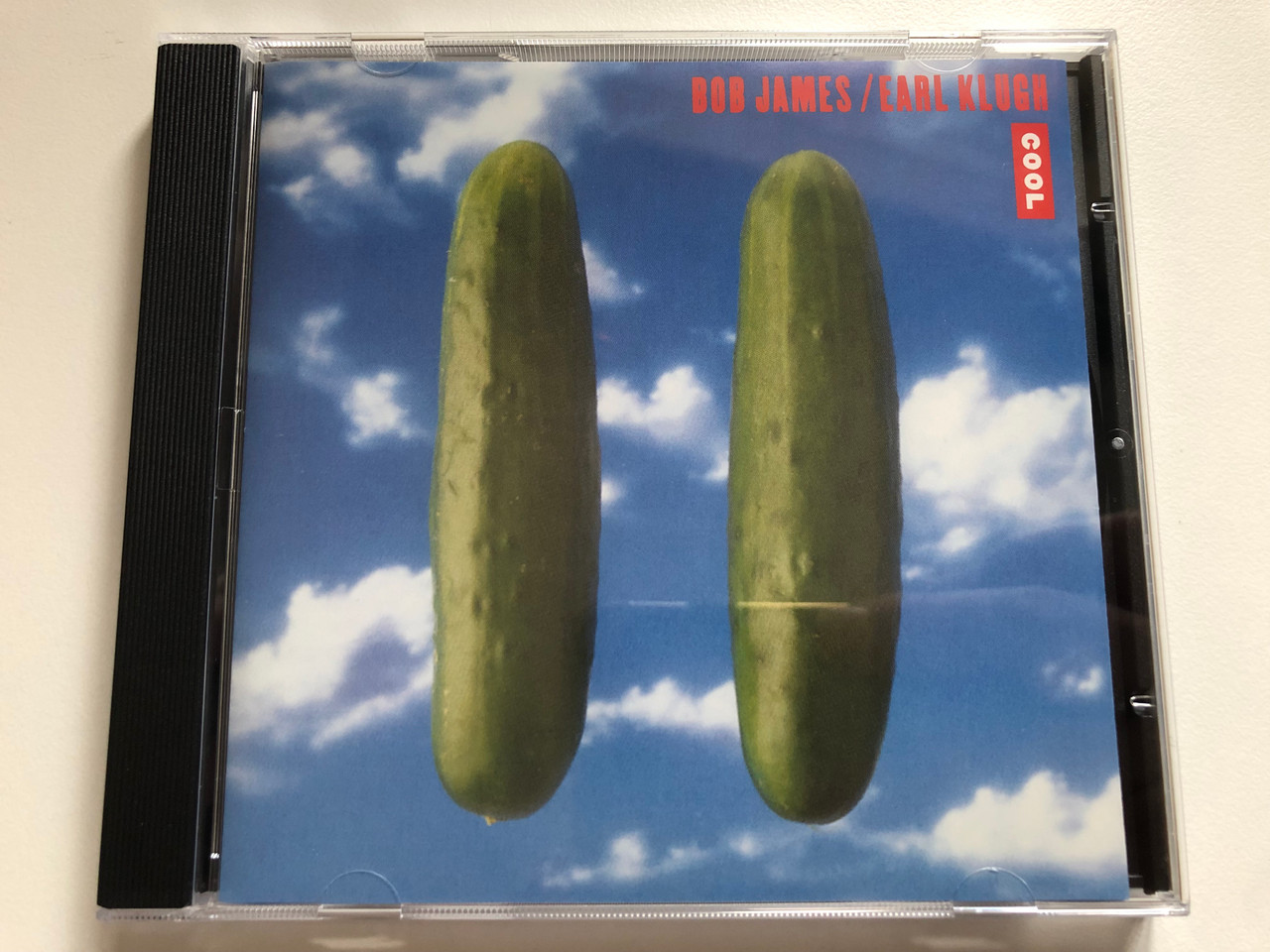 https://cdn10.bigcommerce.com/s-62bdpkt7pb/products/0/images/220088/Bob_James_Earl_Klugh_Cool_Warner_Bros._Records_Audio_CD_1992_7599-26939-2_1__23203.1648788195.1280.1280.JPG?c=2&_gl=1*htvcp1*_ga*MjA2NTIxMjE2MC4xNTkwNTEyNTMy*_ga_WS2VZYPC6G*MTY0ODc4MDMyNC4zMzkuMS4xNjQ4Nzg4MDYwLjQx