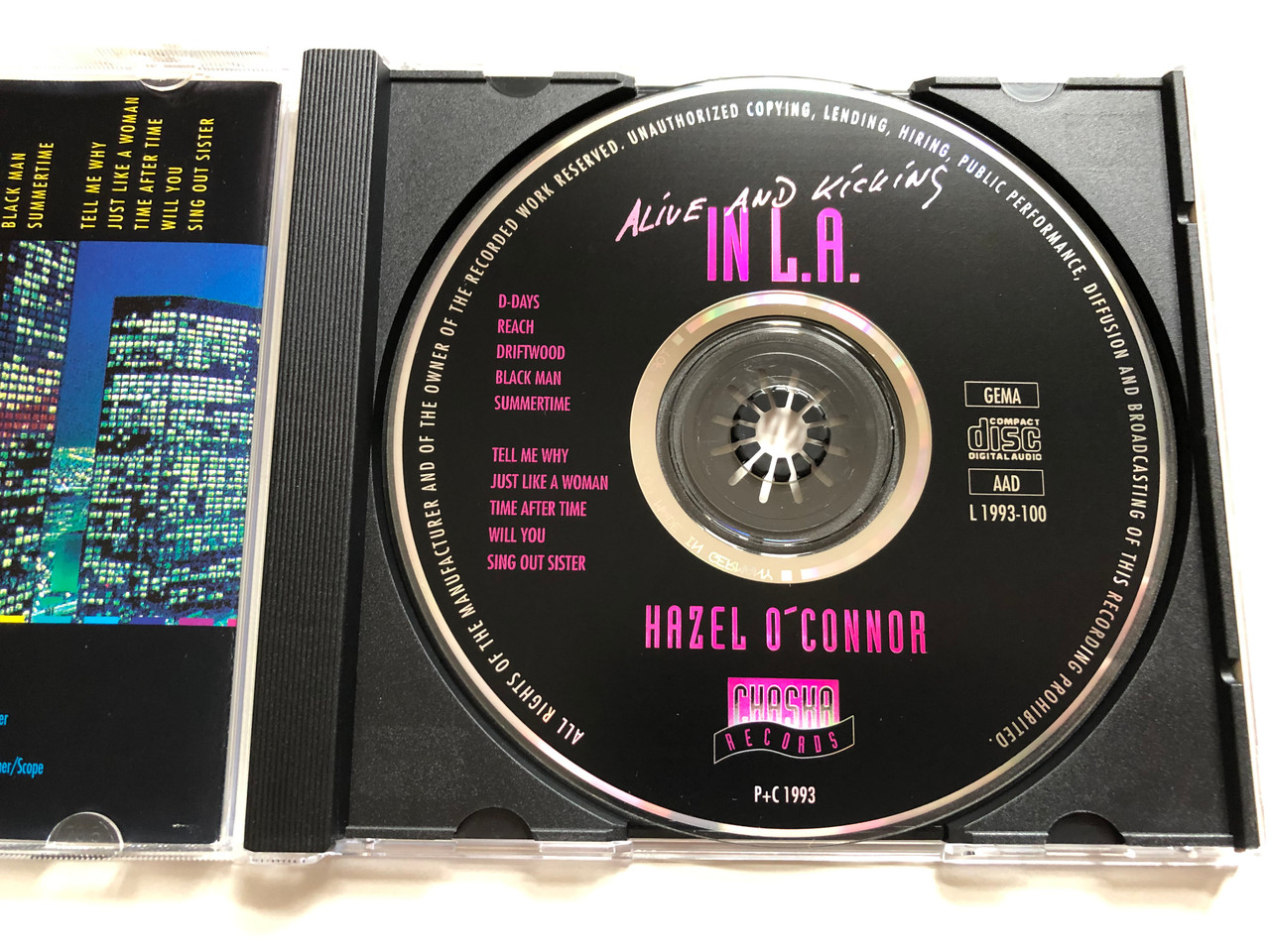 https://cdn10.bigcommerce.com/s-62bdpkt7pb/products/0/images/220093/Alive_And_Kicking_In_LA_-_Hazel_OConnor_Chasha_Records_Audio_CD_1993_L1993-100_4__63761.1648788528.1280.1280.JPG?c=2&_gl=1*1q4sst2*_ga*MjA2NTIxMjE2MC4xNTkwNTEyNTMy*_ga_WS2VZYPC6G*MTY0ODc4MDMyNC4zMzkuMS4xNjQ4Nzg4MzI0LjMx