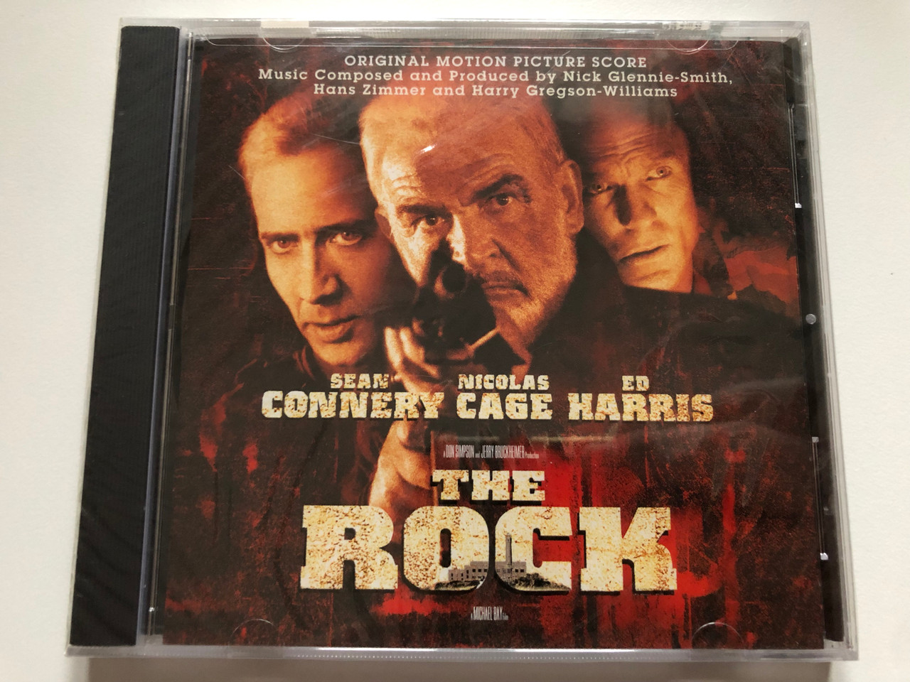 https://cdn10.bigcommerce.com/s-62bdpkt7pb/products/0/images/220652/The_Rock_Original_Motion_Picture_Score_-_Sean_Connery_Nicolas_Cage_Ed_Harris_Music_Composed_and_Produced_by_Nick_Glennie-Smith_Hans_Zimmer_and_Harry_Gregson-Williams_Hollywood_Records_A_1__18132.1649169442.1280.1280.JPG?c=2&_gl=1*ct8mva*_ga*MjA2NTIxMjE2MC4xNTkwNTEyNTMy*_ga_WS2VZYPC6G*MTY0OTE2ODI5OS4zNDMuMS4xNjQ5MTY4OTYwLjQx