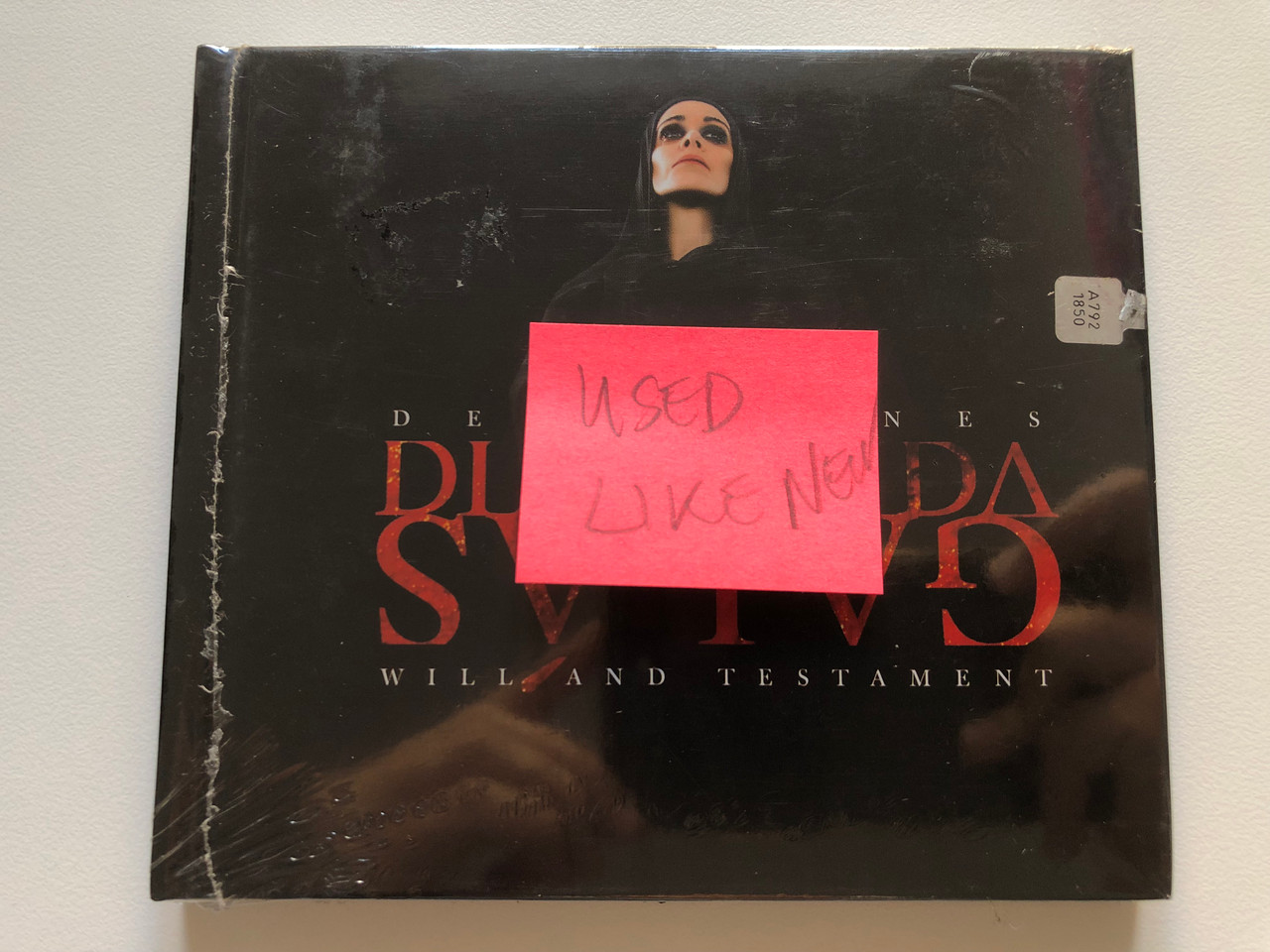 https://cdn10.bigcommerce.com/s-62bdpkt7pb/products/0/images/220679/Diamanda_Gals_Defixiones_Will_And_Testament_Mute_Audio_CD_2003_CDStumm205_4__26480.1649173647.1280.1280.JPG?c=2&_gl=1*1e01zh0*_ga*MjA2NTIxMjE2MC4xNTkwNTEyNTMy*_ga_WS2VZYPC6G*MTY0OTE2ODI5OS4zNDMuMS4xNjQ5MTczMjk3LjQz