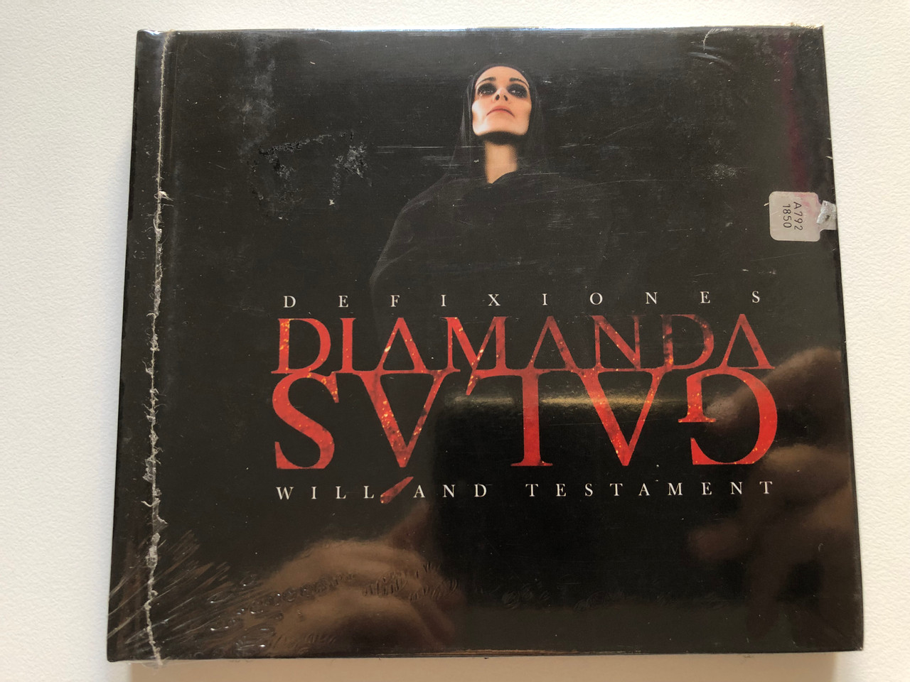 https://cdn10.bigcommerce.com/s-62bdpkt7pb/products/0/images/220680/Diamanda_Gals_Defixiones_Will_And_Testament_Mute_Audio_CD_2003_CDStumm205_1__28742.1649173649.1280.1280.JPG?c=2&_gl=1*1e01zh0*_ga*MjA2NTIxMjE2MC4xNTkwNTEyNTMy*_ga_WS2VZYPC6G*MTY0OTE2ODI5OS4zNDMuMS4xNjQ5MTczMjk3LjQz