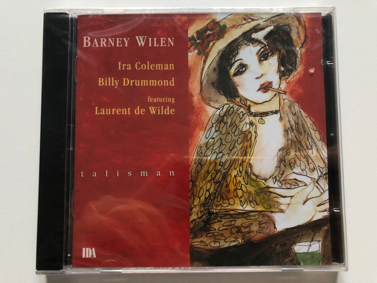 https://cdn10.bigcommerce.com/s-62bdpkt7pb/products/0/images/221014/Barney_Wilen_Talisman_Ira_Coleman_Billy_Drummond_featuring_Laurent_de_Wilde_IDA_Records_Audio_CD_1994_IDA_037_CD_1__89168.1649336976.1280.1280.JPG?c=2&_gl=1*hewm6m*_ga*MjA2NTIxMjE2MC4xNTkwNTEyNTMy*_ga_WS2VZYPC6G*MTY0OTMzNjIxNC4zNDYuMS4xNjQ5MzM2OTQ4LjYw