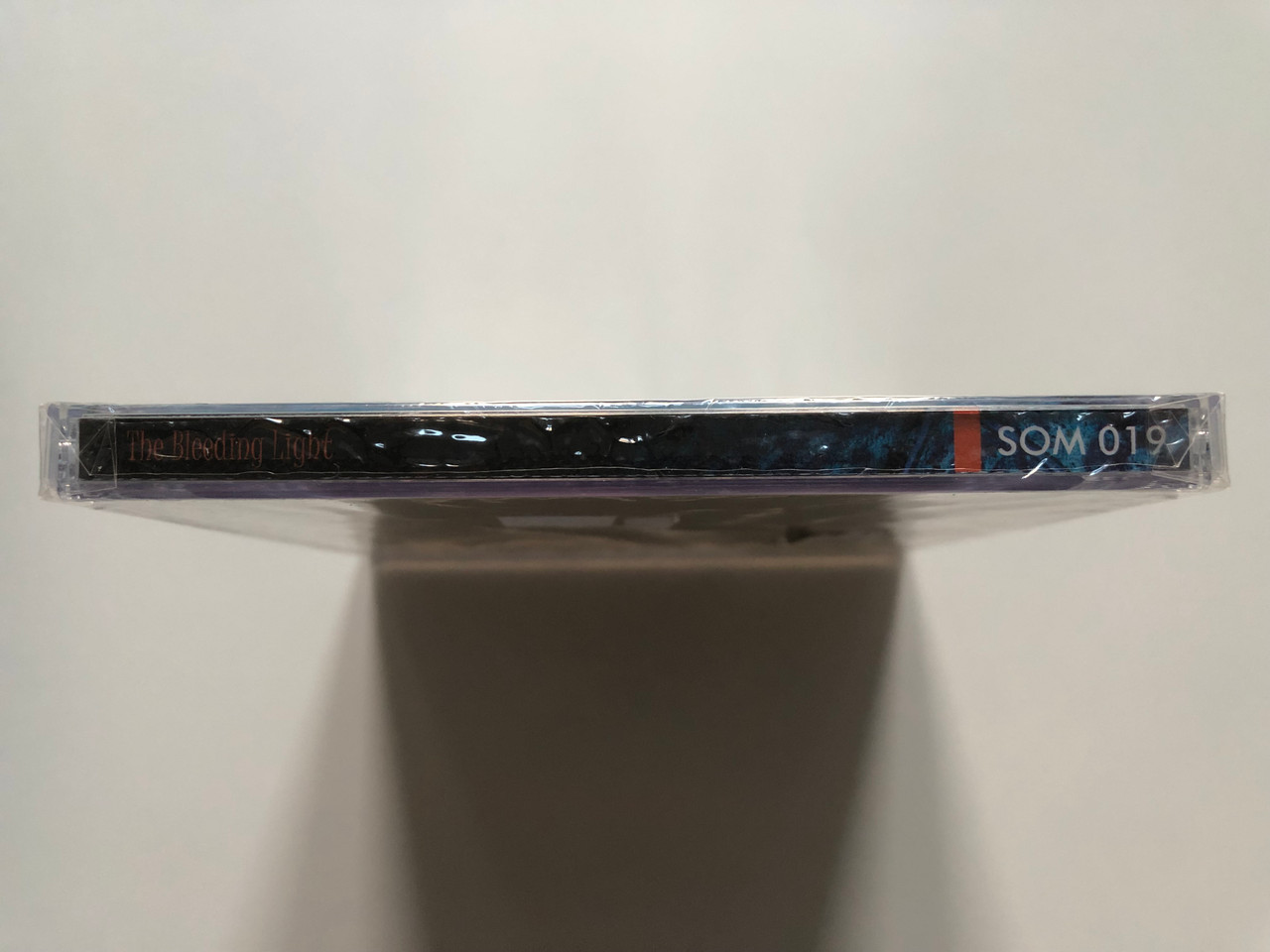 https://cdn10.bigcommerce.com/s-62bdpkt7pb/products/0/images/221015/The_Bleeding_Light_Season_Of_Mist_Audio_CD_1999_SOM_019_3__37230.1649337343.1280.1280.JPG?c=2&_gl=1*wt0vj1*_ga*MjA2NTIxMjE2MC4xNTkwNTEyNTMy*_ga_WS2VZYPC6G*MTY0OTMzNjIxNC4zNDYuMS4xNjQ5MzM3MzYwLjYw