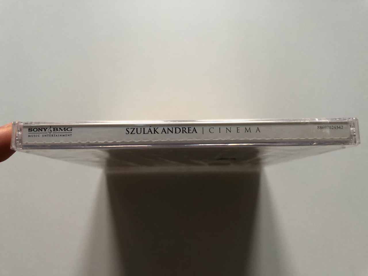 https://cdn10.bigcommerce.com/s-62bdpkt7pb/products/0/images/221040/Szulk_Andrea_Cinema_Sony_BMG_Music_Entertainment_Audio_CD_2006_88697024342_3__39685.1649338301.1280.1280.JPG?c=2&_gl=1*1ckzt6p*_ga*MjA2NTIxMjE2MC4xNTkwNTEyNTMy*_ga_WS2VZYPC6G*MTY0OTMzNjIxNC4zNDYuMS4xNjQ5MzM4MTUxLjQz