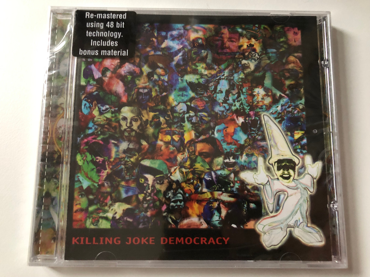 https://cdn10.bigcommerce.com/s-62bdpkt7pb/products/0/images/221071/Killing_Joke_Democracy_Re-mastered_using_48_bit_techology._Includes_bonus_material_Cooking_Vinyl_Audio_CD_2005_COOKCD345_1__54270.1649340851.1280.1280.JPG?c=2&_gl=1*eo55lw*_ga*MjA2NTIxMjE2MC4xNTkwNTEyNTMy*_ga_WS2VZYPC6G*MTY0OTMzNjIxNC4zNDYuMS4xNjQ5MzQwNjE1LjU3