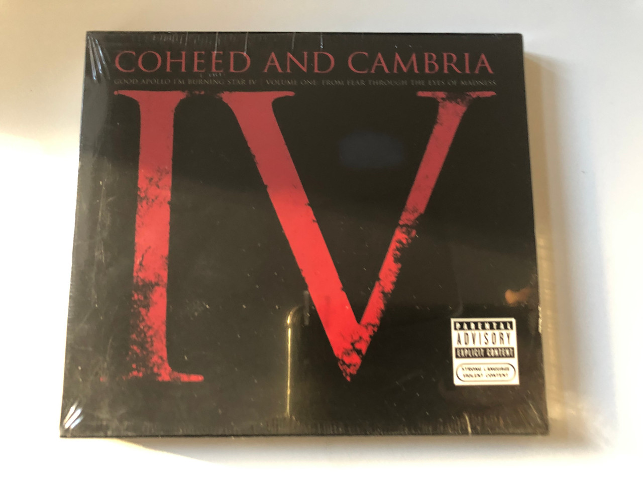 https://cdn10.bigcommerce.com/s-62bdpkt7pb/products/0/images/221079/Coheed_And_Cambria_Good_Apollo_Im_Burning_Star_IV_Volume_One_From_Fear_Through_The_Eyes_Of_Madness_Columbia_Audio_CD_2005_520471_2_1__39654.1649343615.1280.1280.JPG?c=2&_gl=1*1m18ros*_ga*MjA2NTIxMjE2MC4xNTkwNTEyNTMy*_ga_WS2VZYPC6G*MTY0OTM0MjkyNy4zNDcuMS4xNjQ5MzQzNDUwLjUx