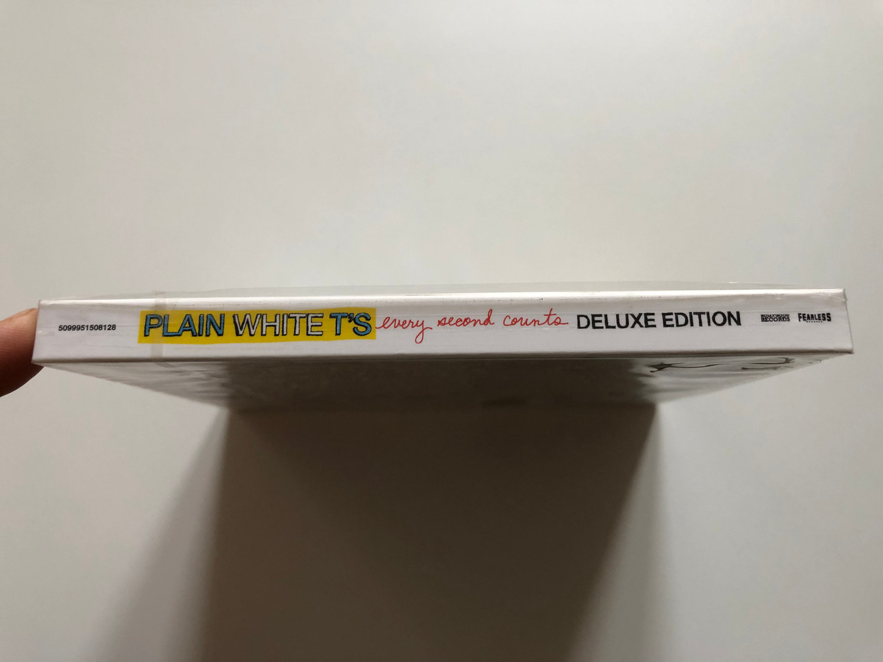 https://cdn10.bigcommerce.com/s-62bdpkt7pb/products/0/images/221155/Plain_White_Ts_Every_Second_Counts_Deluxe_Edition_CD_DVD_Feat._Live_Concert_And_Videos_Includes_massive_hits_Hey_There_Delilah_Our_Time_Now_Hollywood_Records_Audio_CD_DVD_Vid_4__68440.1649409933.1280.1280.JPG?c=2&_gl=1*1fkcz0c*_ga*MjA2NTIxMjE2MC4xNTkwNTEyNTMy*_ga_WS2VZYPC6G*MTY0OTQwOTM3NC4zNDkuMS4xNjQ5NDA5OTMyLjYw