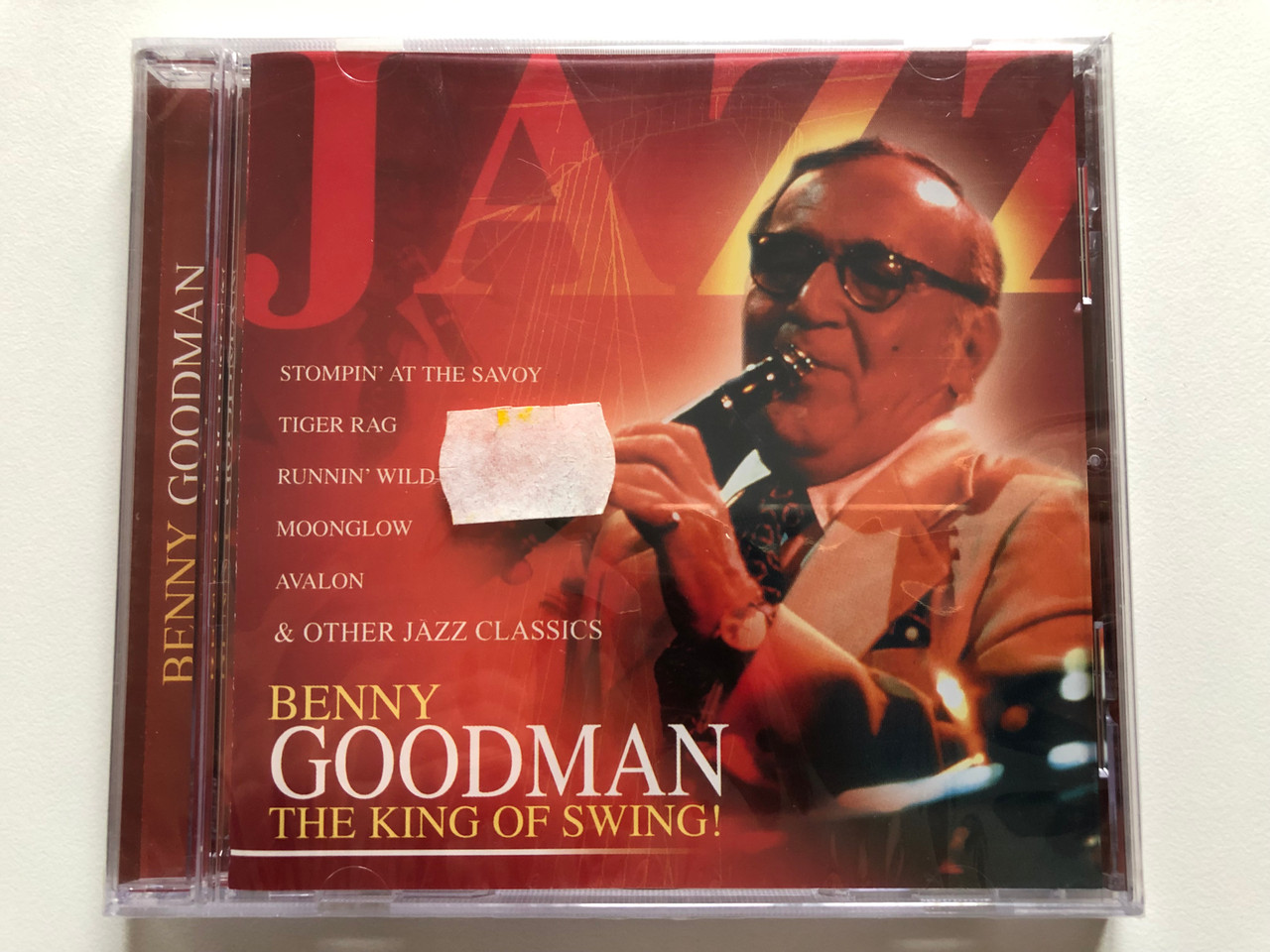 https://cdn10.bigcommerce.com/s-62bdpkt7pb/products/0/images/221159/Benny_Goodman_The_King_Of_Swing_Stompin_At_The_Savoy_Tiger_Rag_Runnin_Wild_Moonglow_Avalon_other_jazz_classics_Going_For_A_Song_GFS460_1__95938.1649410347.1280.1280.JPG?c=2&_gl=1*cak12t*_ga*MjA2NTIxMjE2MC4xNTkwNTEyNTMy*_ga_WS2VZYPC6G*MTY0OTQwOTM3NC4zNDkuMS4xNjQ5NDEwMTM1LjM3