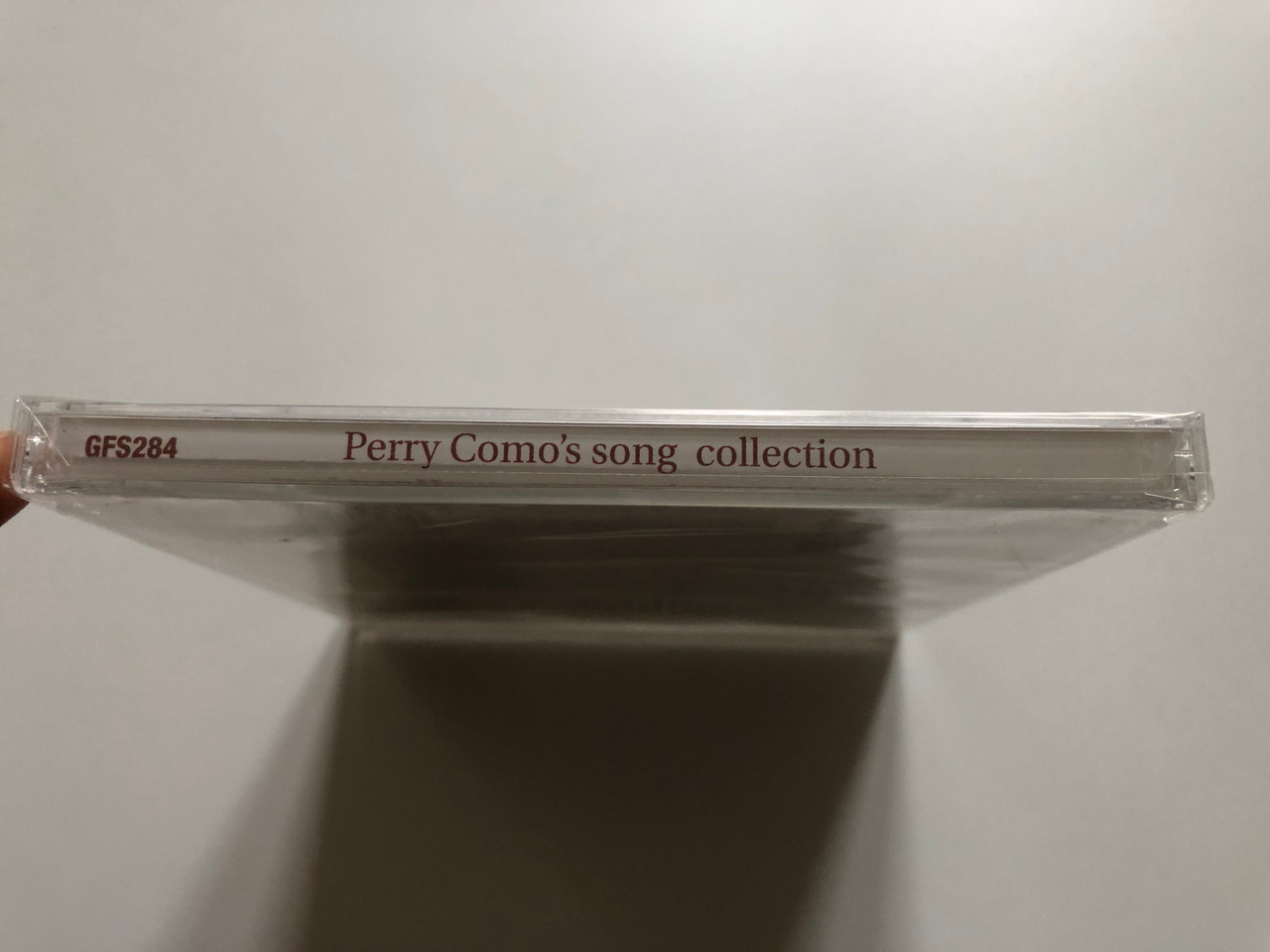 https://cdn10.bigcommerce.com/s-62bdpkt7pb/products/0/images/221170/Perry_Comos_Song_Collection_Including_Lazy_Bones_My_Ideal_I_Have_Faith_and_many_more_Going_For_A_Song_Audio_CD_GFS284_3__81876.1649412210.1280.1280.JPG?c=2&_gl=1*1p87a8s*_ga*MjA2NTIxMjE2MC4xNTkwNTEyNTMy*_ga_WS2VZYPC6G*MTY0OTQwOTM3NC4zNDkuMS4xNjQ5NDEyMDQ2LjQy