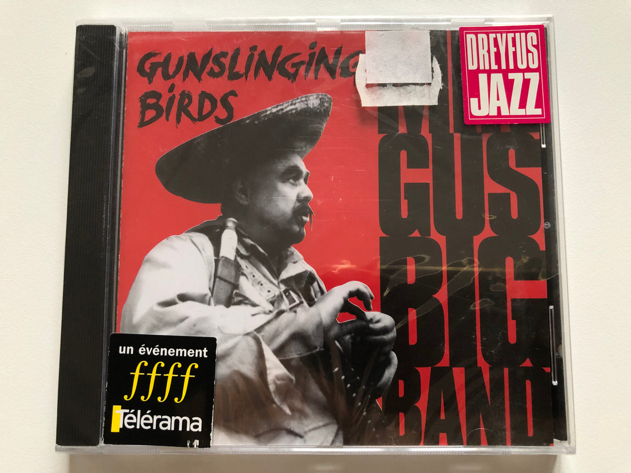 https://cdn10.bigcommerce.com/s-62bdpkt7pb/products/0/images/221309/Mingus_Big_Band_Gunslinging_Birds_Dreyfus_Jazz_Audio_CD_1995_FDM_36575-2_1__09347.1649662173.1280.1280.JPG?c=2&_gl=1*tu4od0*_ga*MjA2NTIxMjE2MC4xNTkwNTEyNTMy*_ga_WS2VZYPC6G*MTY0OTY1NzEzNy4zNTMuMS4xNjQ5NjYyMDQ1LjI5