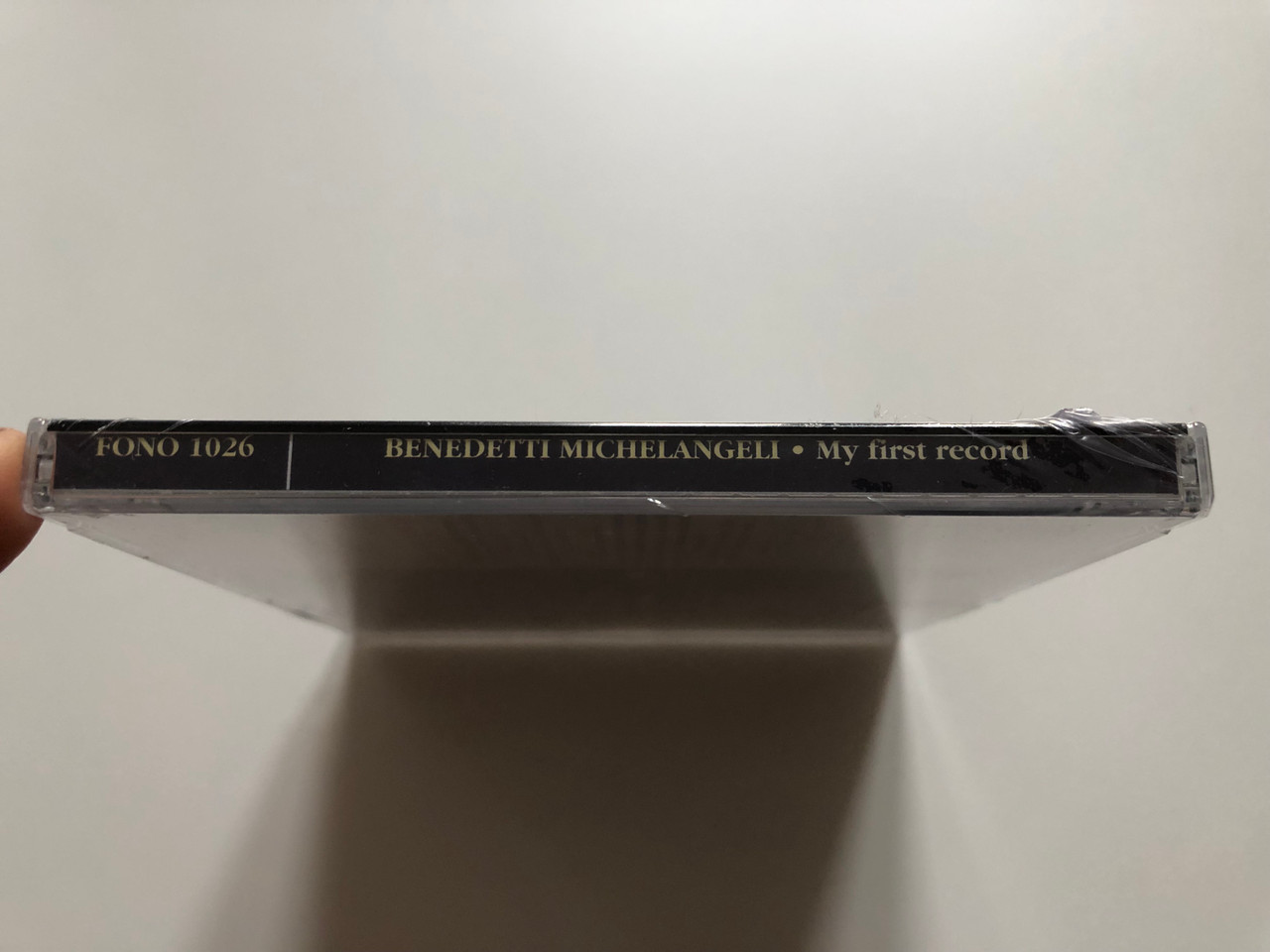 https://cdn10.bigcommerce.com/s-62bdpkt7pb/products/0/images/221310/Benedetti_Michelangeli_-_My_First_Record_Debut_Series_Fono_Enterprise_Audio_CD_2001_FONO_1026_3__52011.1649662539.1280.1280.JPG?c=2&_gl=1*teotp2*_ga*MjA2NTIxMjE2MC4xNTkwNTEyNTMy*_ga_WS2VZYPC6G*MTY0OTY1NzEzNy4zNTMuMS4xNjQ5NjYyMzE4LjM3