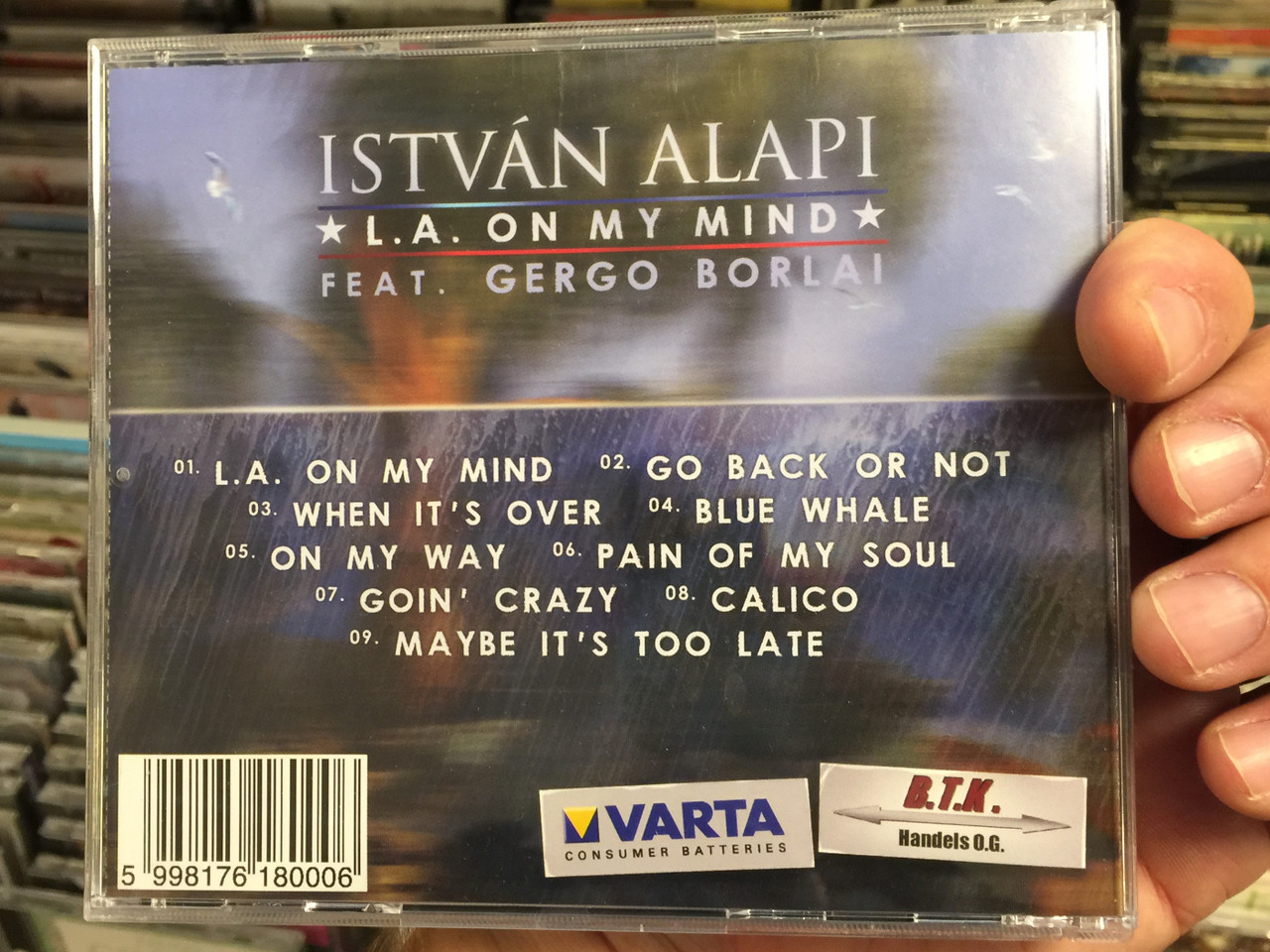 https://cdn10.bigcommerce.com/s-62bdpkt7pb/products/0/images/221336/Istvn_Alapi_Feat._Gergo_Borlai_L._A._On_My_Mind_Audio_CD_5998176180006_2__43461.1649669119.1280.1280.JPG?c=2&_gl=1*1bgmcea*_ga*MjA2NTIxMjE2MC4xNTkwNTEyNTMy*_ga_WS2VZYPC6G*MTY0OTY1NzEzNy4zNTMuMS4xNjQ5NjY4OTg5LjE0