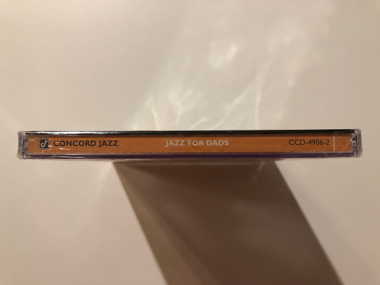 https://cdn10.bigcommerce.com/s-62bdpkt7pb/products/0/images/221347/Jazz_For_Dads_Concord_Jazz_Audio_CD_2000_CCD-4906-2_3__40547.1649670653.1280.1280.JPG?c=2&_gl=1*2vdv4u*_ga*MjA2NTIxMjE2MC4xNTkwNTEyNTMy*_ga_WS2VZYPC6G*MTY0OTY1NzEzNy4zNTMuMS4xNjQ5NjcwNjQ3LjYw