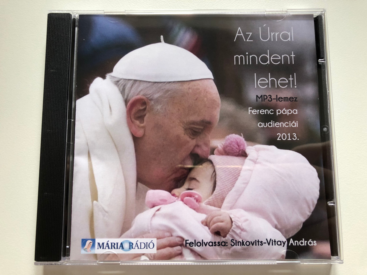 https://cdn10.bigcommerce.com/s-62bdpkt7pb/products/0/images/221429/Az_Urral_mindent_lehet_MP3-lemez_Ferenc_papa_audiencial_2013._Felolvassa_Sinkovits-Vitay_Andras_Audio_CD_1__75410.1649774505.1280.1280.JPG?c=2&_gl=1*1xba6ql*_ga*MjA2NTIxMjE2MC4xNTkwNTEyNTMy*_ga_WS2VZYPC6G*MTY0OTc2NzAzNy4zNTQuMS4xNjQ5Nzc0NDczLjYw