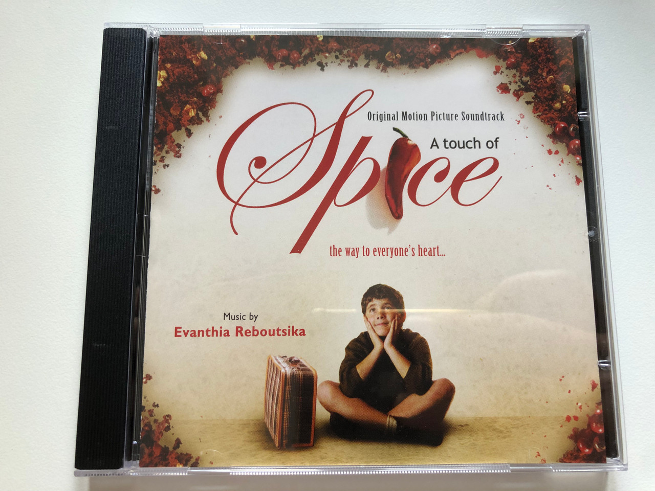 https://cdn10.bigcommerce.com/s-62bdpkt7pb/products/0/images/221438/A_Touch_Of_Spice_Original_Motion_Picture_Soundtrack_Music_By_Evanthia_Reboutsika_The_Way_To_Everyones_heart..._Colosseum_Audio_CD_2004_CST_8095.2_1__36226.1649775555.1280.1280.JPG?c=2&_gl=1*19joz0o*_ga*MjA2NTIxMjE2MC4xNTkwNTEyNTMy*_ga_WS2VZYPC6G*MTY0OTc2NzAzNy4zNTQuMS4xNjQ5Nzc1NTQ1LjYw