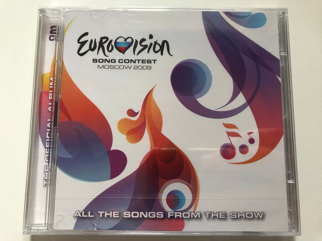 https://cdn10.bigcommerce.com/s-62bdpkt7pb/products/0/images/221961/Eurovision_Song_Contest_Moscow_2009_All_The_Songs_From_The_Show_CMC_2x_Audio_CD_2009_5099969968020_1__52346.1649867570.1280.1280.JPG?c=2&_gl=1*10bcz54*_ga*MjA2NTIxMjE2MC4xNTkwNTEyNTMy*_ga_WS2VZYPC6G*MTY0OTg1ODIyMS4zNTUuMS4xNjQ5ODY3NDU4LjM2