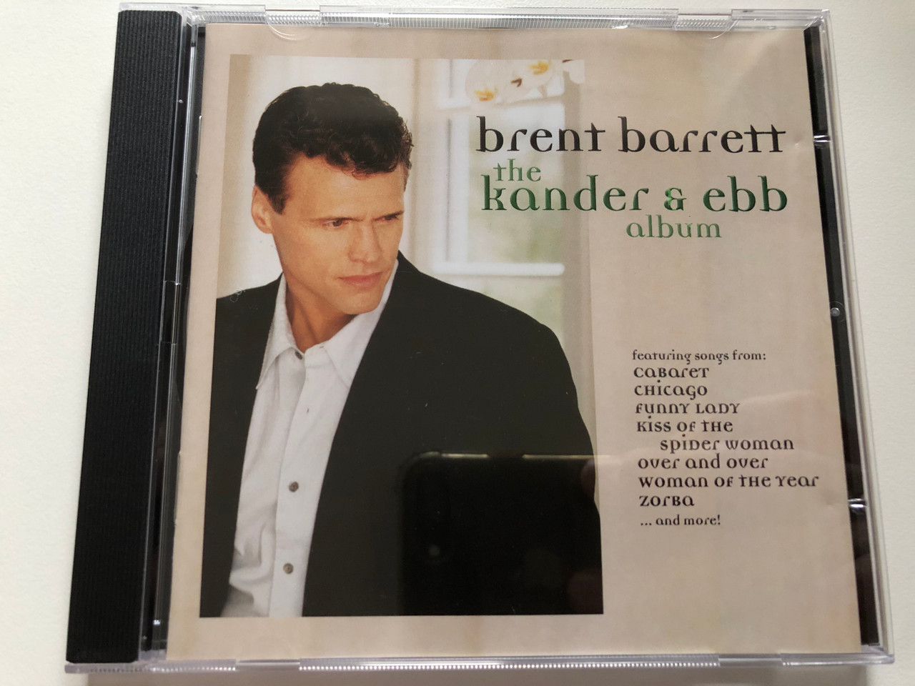 https://cdn10.bigcommerce.com/s-62bdpkt7pb/products/0/images/221965/Brent_Barrett_-_The_Kander_Ebb_Album_Featuring_Songs_from_Cabaret_Chicago_Funny_Lady_Kiss_Of_The_Spider_Woman_Over_And_Over_Woman_Of_The_Year_Zorba...and_more_Varse_Sarabande_Rec_1__67002.1649868722.1280.1280.JPG?c=2&_gl=1*tdsxrt*_ga*MjA2NTIxMjE2MC4xNTkwNTEyNTMy*_ga_WS2VZYPC6G*MTY0OTg1ODIyMS4zNTUuMS4xNjQ5ODY4Mjk0LjQ.