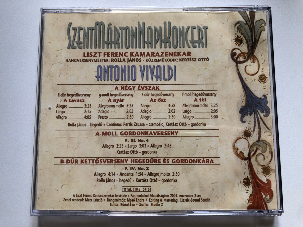https://cdn10.bigcommerce.com/s-62bdpkt7pb/products/0/images/221984/Antonio_Vivaldi_-_Szent_Marton_Napi_Koncert_Pannonhalma_2001_-_Liszt_Ferenc_Kamarazenekar_Hangversenymester_Rolla_Janos_Kozremukodik_Kertesz_Otto_A_Magyar_Kulkereskedelmi_Bank_Audio_CD_4__40943.1649871014.1280.1280.JPG?c=2&_gl=1*1acg1vl*_ga*MjA2NTIxMjE2MC4xNTkwNTEyNTMy*_ga_WS2VZYPC6G*MTY0OTg1ODIyMS4zNTUuMS4xNjQ5ODcwNTQyLjU4