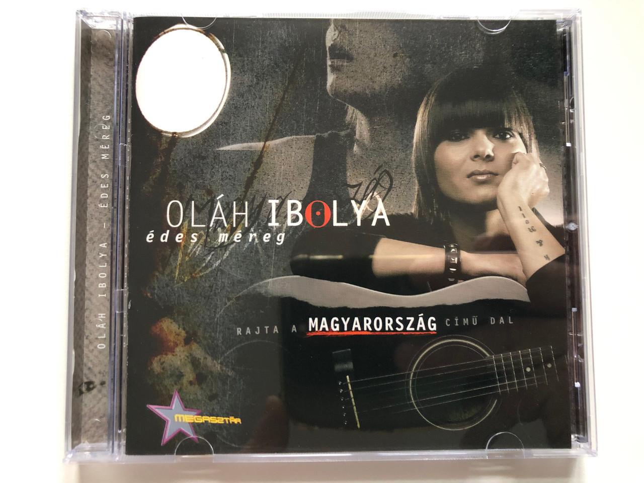 https://cdn10.bigcommerce.com/s-62bdpkt7pb/products/0/images/222011/Olh_Ibolya_des_Mreg_Sony_BMG_Music_Entertainment_Audio_CD_2005_82876737662_1__33620.1649941264.1280.1280.JPG?c=2&_gl=1*hddrz1*_ga*MjA2NTIxMjE2MC4xNTkwNTEyNTMy*_ga_WS2VZYPC6G*MTY0OTkzODE4Mi4zNTYuMS4xNjQ5OTQxMTczLjQx