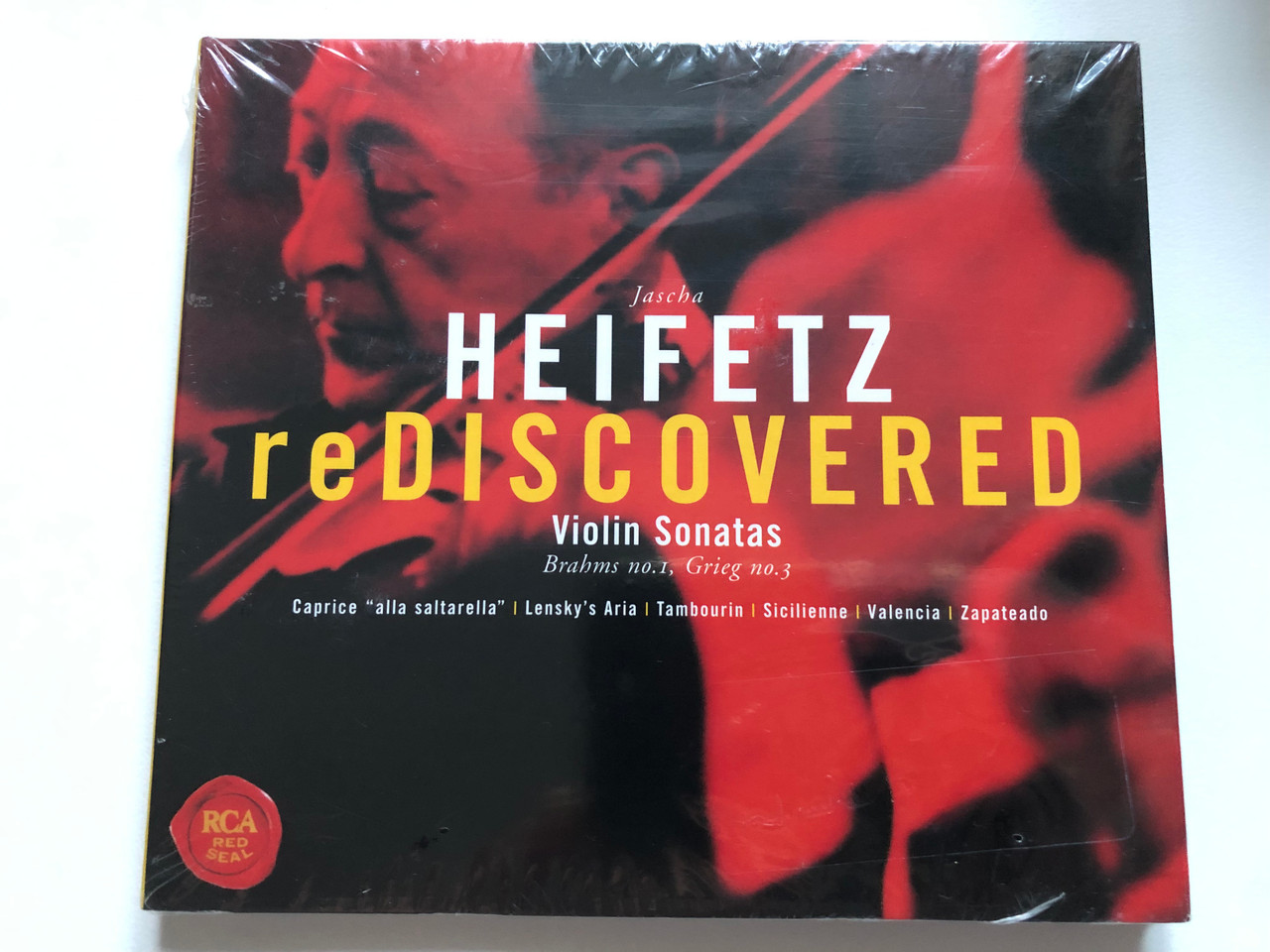https://cdn10.bigcommerce.com/s-62bdpkt7pb/products/0/images/222036/Jascha_Heifetz_Heifetz_Rediscovered_-_Violin_Sonatas_Brahms_no._1_Grieg_no._3_Caprice_alla_saltarella_Lenskys_Aria_Tambourin_Sicilienne_Valencia_Zapateado_RCA_Victor_Red_Seal_1__03845.1649948411.1280.1280.JPG?c=2&_gl=1*1w6lak9*_ga*MjA2NTIxMjE2MC4xNTkwNTEyNTMy*_ga_WS2VZYPC6G*MTY0OTkzODE4Mi4zNTYuMS4xNjQ5OTQ4NDE3LjYw