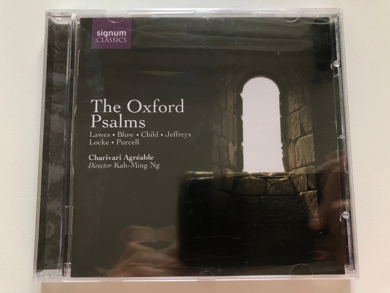 https://cdn10.bigcommerce.com/s-62bdpkt7pb/products/0/images/222585/The_Oxford_Psalms_-_Lawes_Blow_Child_Jeffreys_Locke_Purcell_Charivari_Agreable_Director_Kah-Ming_Ng_Signum_Classics_Audio_CD_2007_SIGCD093_1__84187.1650286102.1280.1280.JPG?c=2&_gl=1*muhmno*_ga*MjA2NTIxMjE2MC4xNTkwNTEyNTMy*_ga_WS2VZYPC6G*MTY1MDI4NTczNy4zNTkuMS4xNjUwMjg2MDYzLjYw